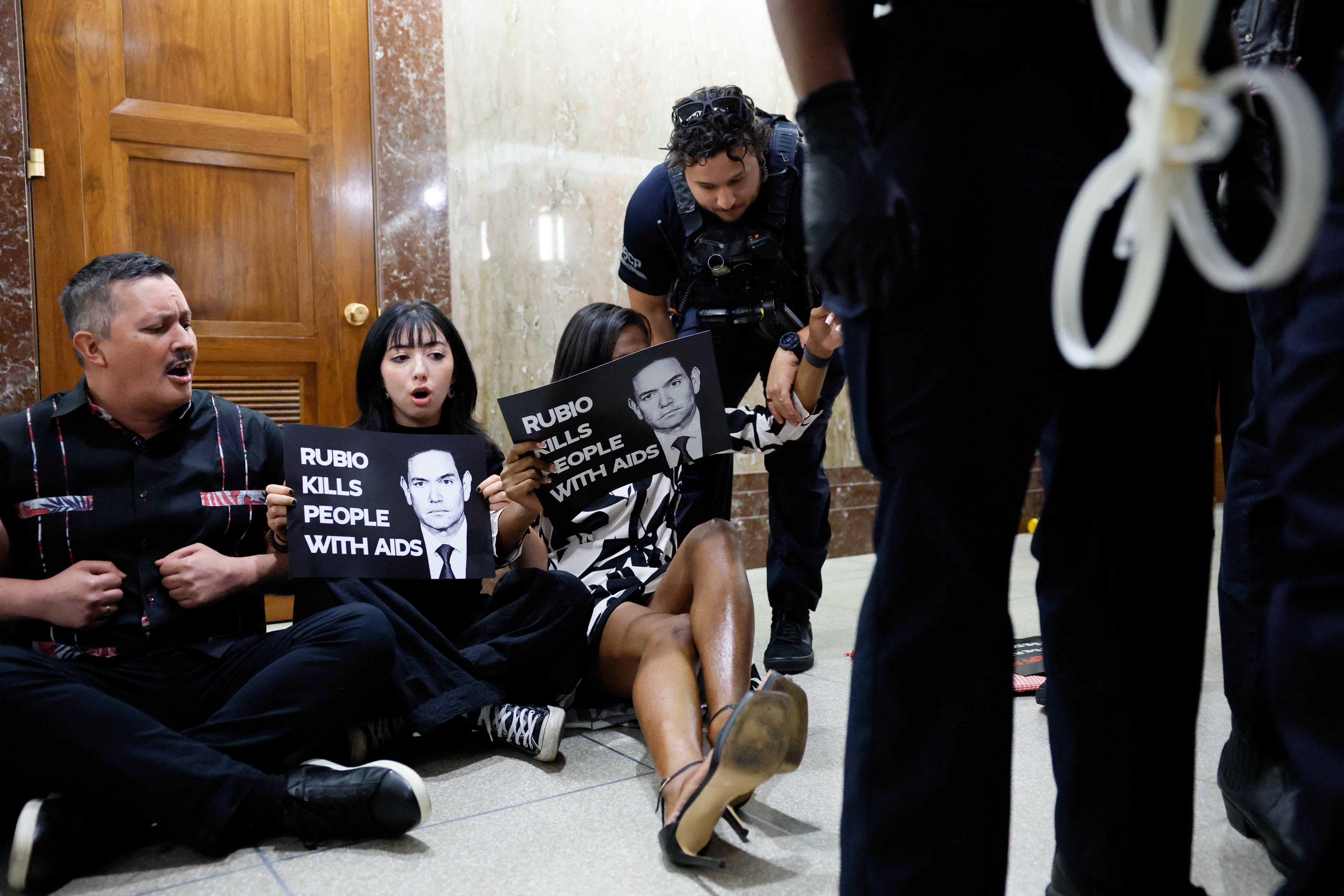 Protesters gathered on Capitol Hill ahead of Secretary of State Marco Rubio's testimony today