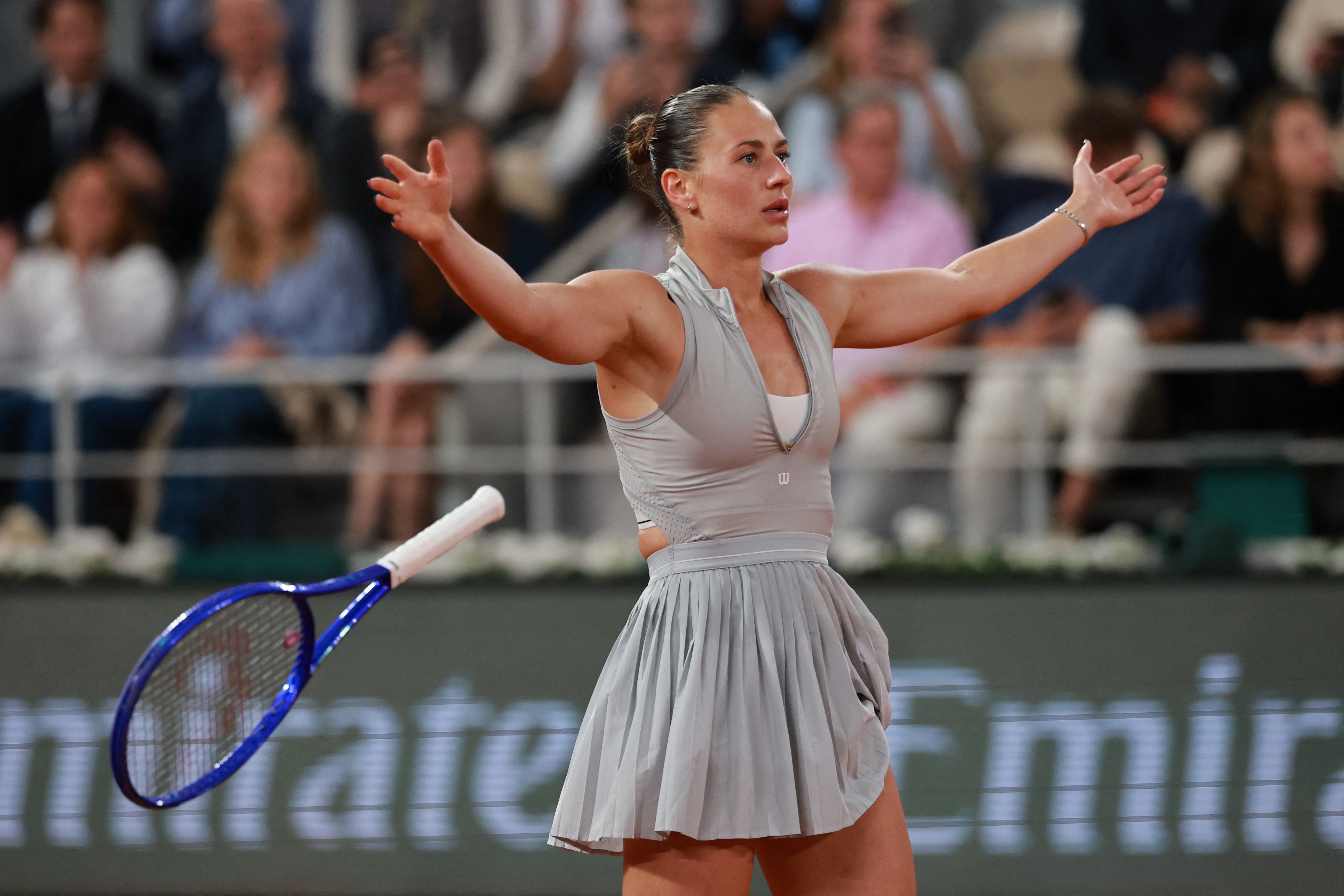 Marta Kostyuk celebrates her 6-3 2-6 6-2 victory over Elina Svitolina