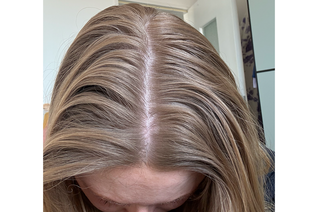 After applying a hefty dose of the gold lust formula (in excess of 10 spritzes), my roots continued looking stringy (Lucy Smith/The Independent)