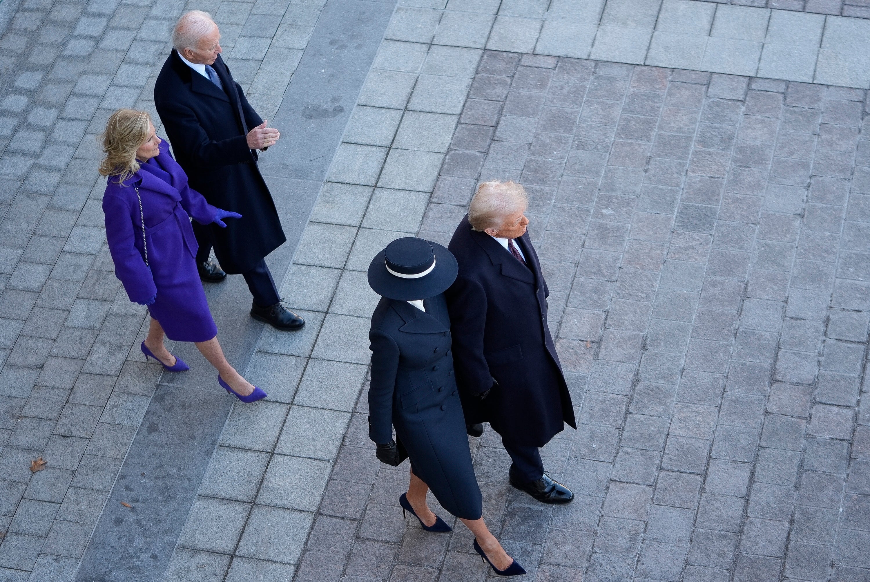 When the two first ladies rode to the ceremony by limousine, Melania only wished to discuss the weather, Dr Biden wrote