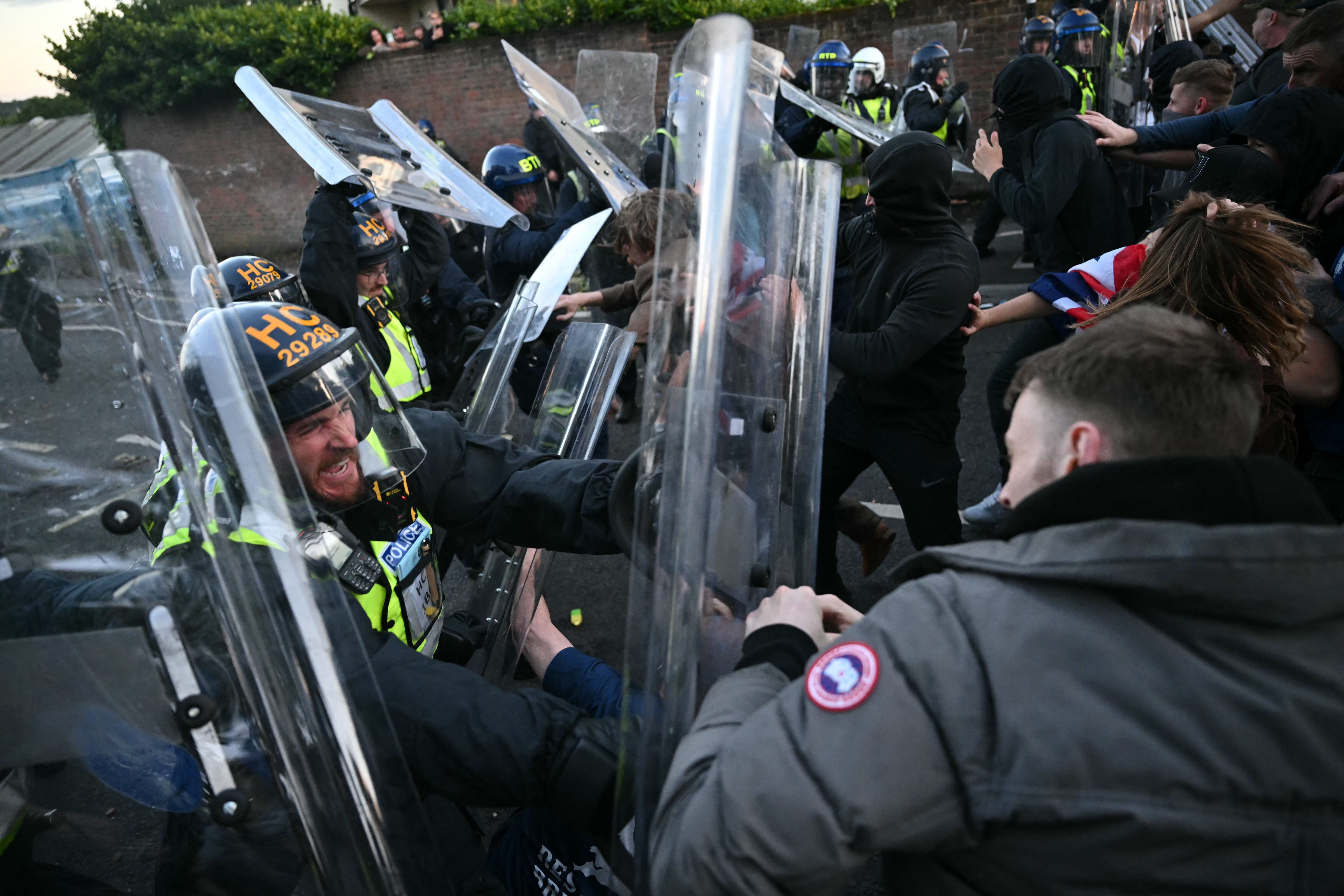 Riot police clash with protesters in Southampton