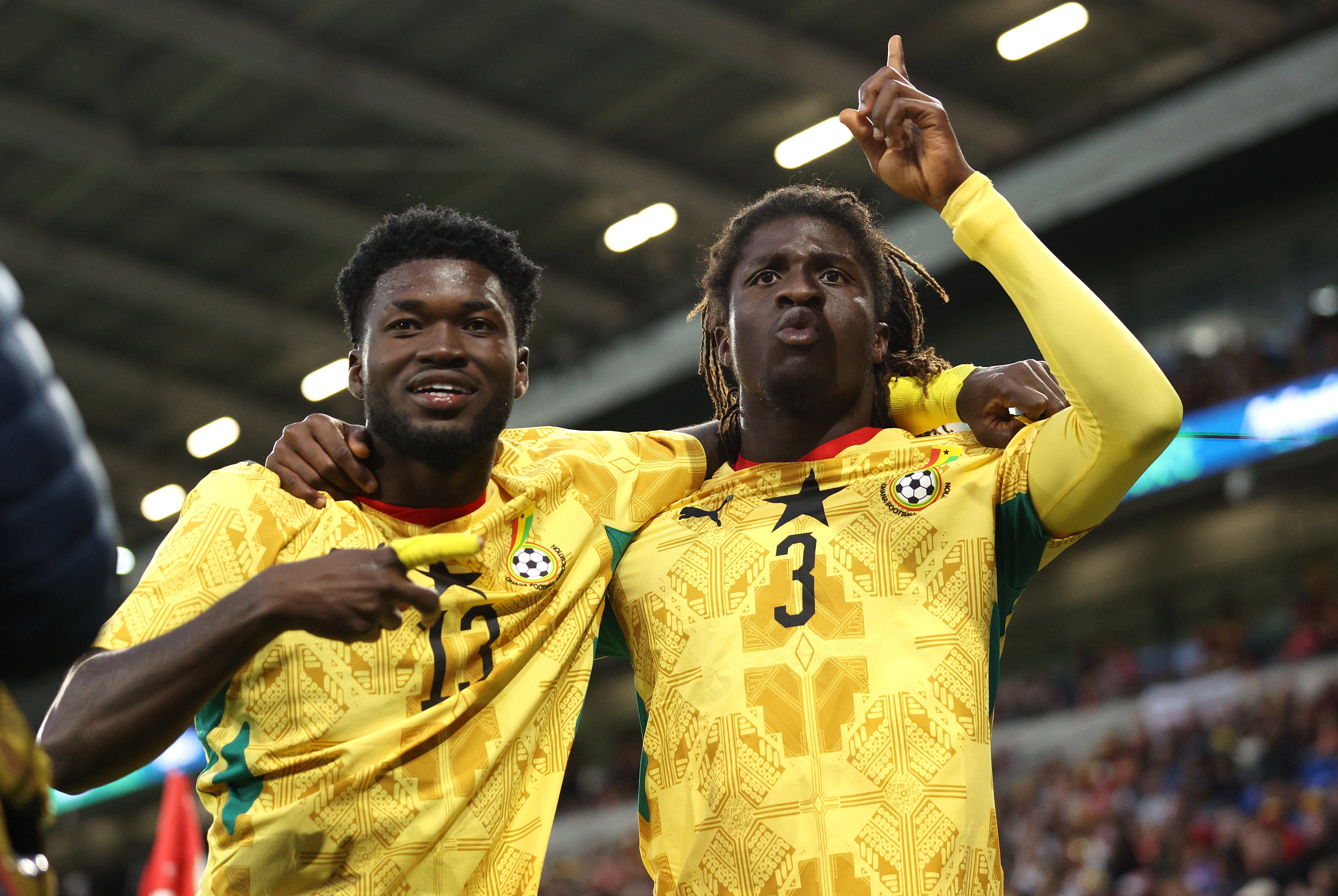 Caleb Yirenkyi (right) celebrates with team mate Christopher Baah after scoring