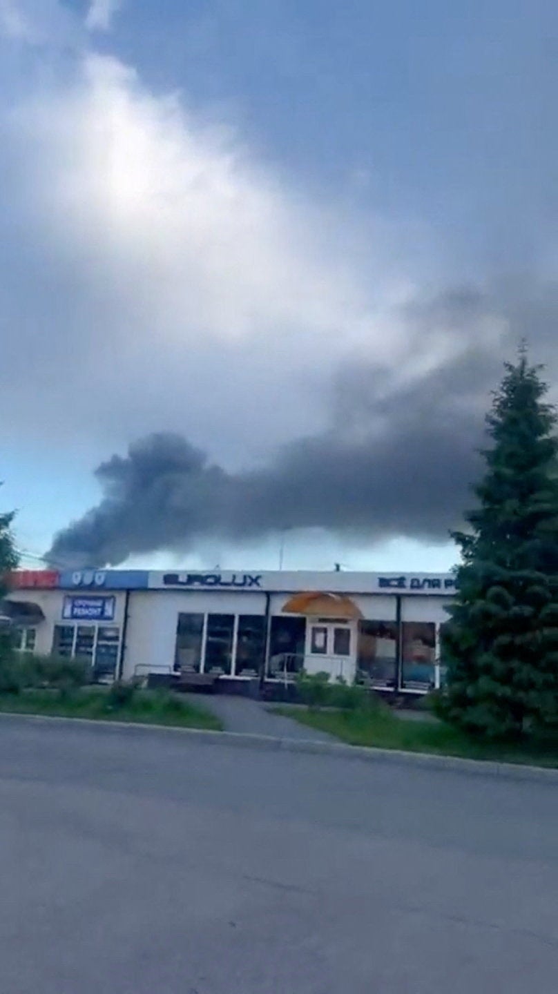 Heavy smoke billows in St Petersburg in Russia after drones hit infrastructure in several districts (Reuters)