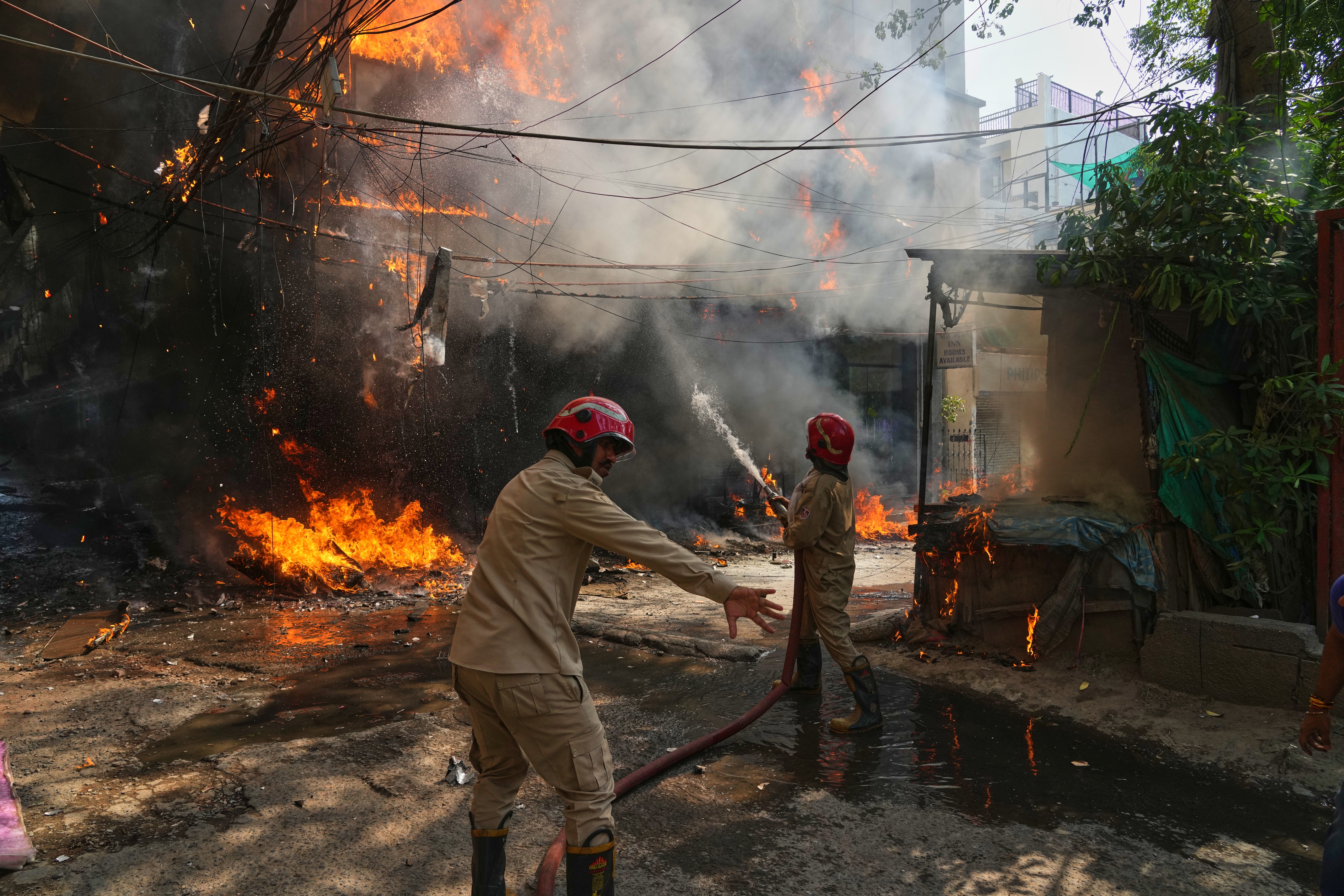 Photos show a rescue operation in a New Delhi hotel fire (Copyright 2026 The Associated Press. All rights reserved.)