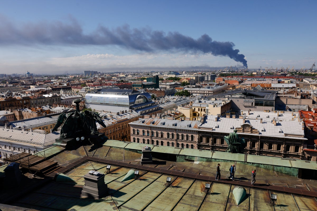 Putin’s ‘Russian Davos’ attacked by Ukrainian drones as oil port targeted