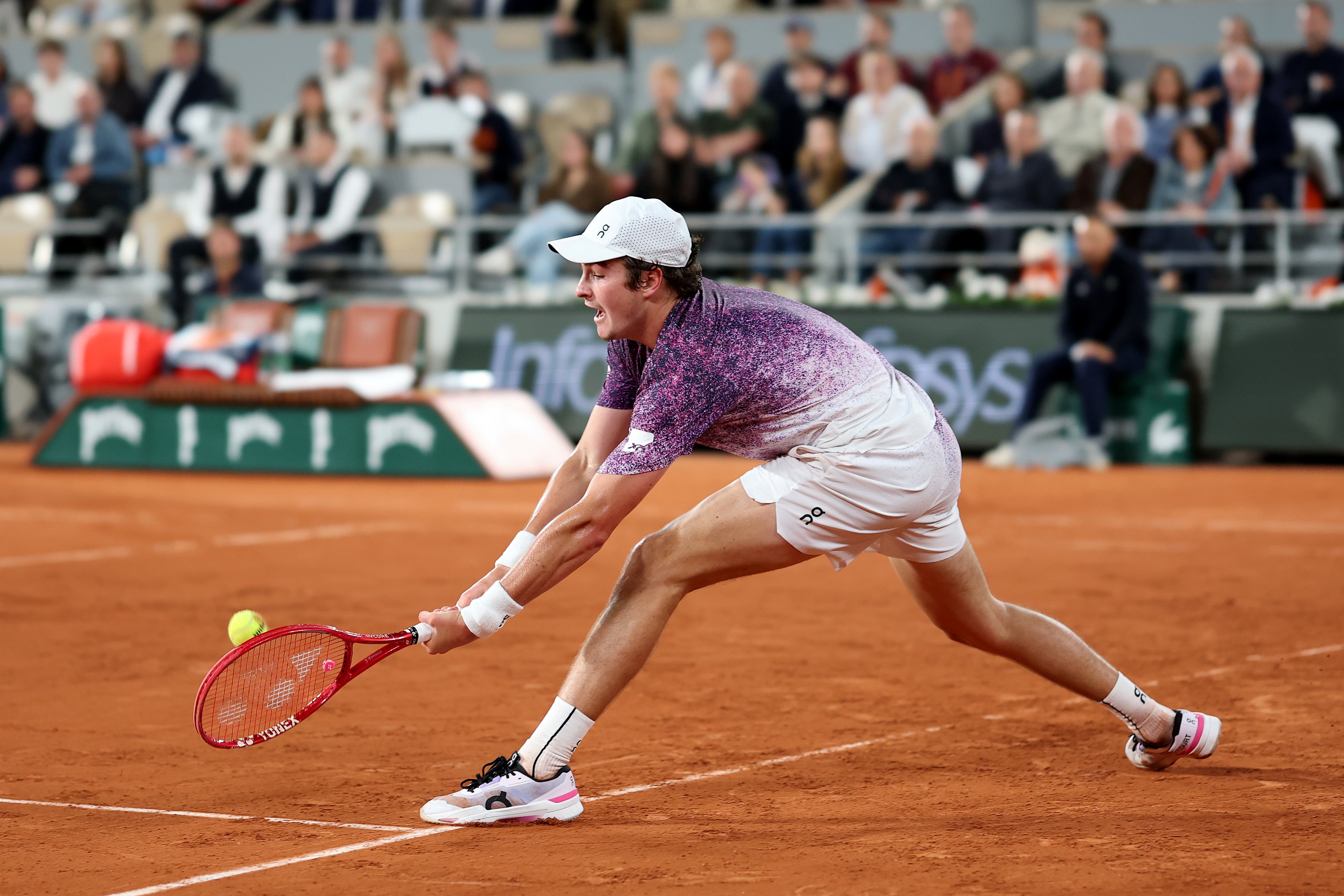 Joao Fonseca was beaten in straight sets by Jakub Mensik in the French Open quarter-finals