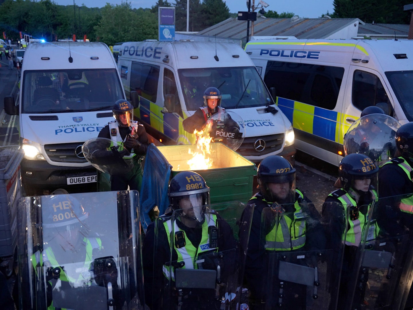 A bin was set on fire during the riot