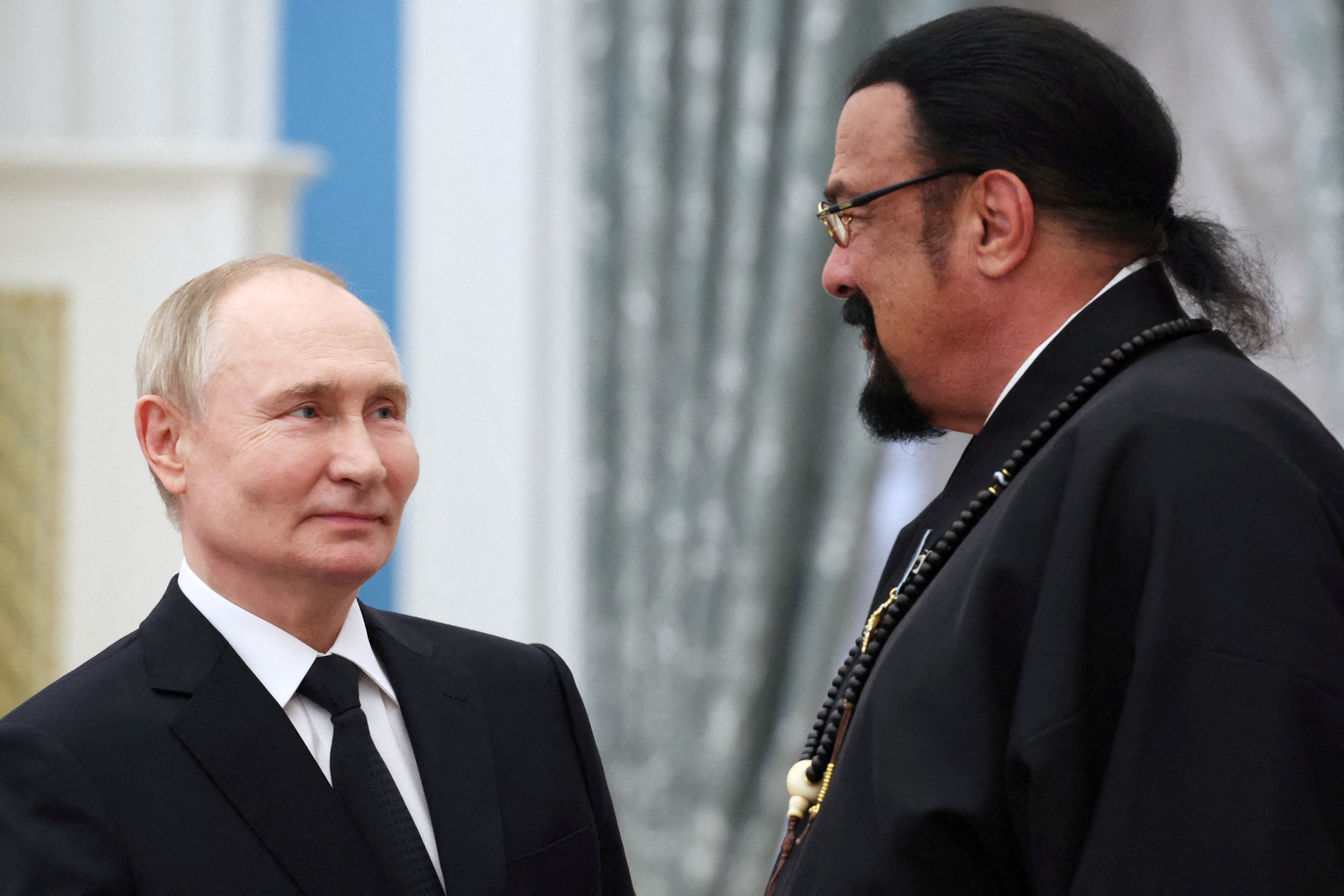 Putin with the Russian Foreign Ministry's special representative for Russian-American humanitarian relations, actor and producer Steven Seagal