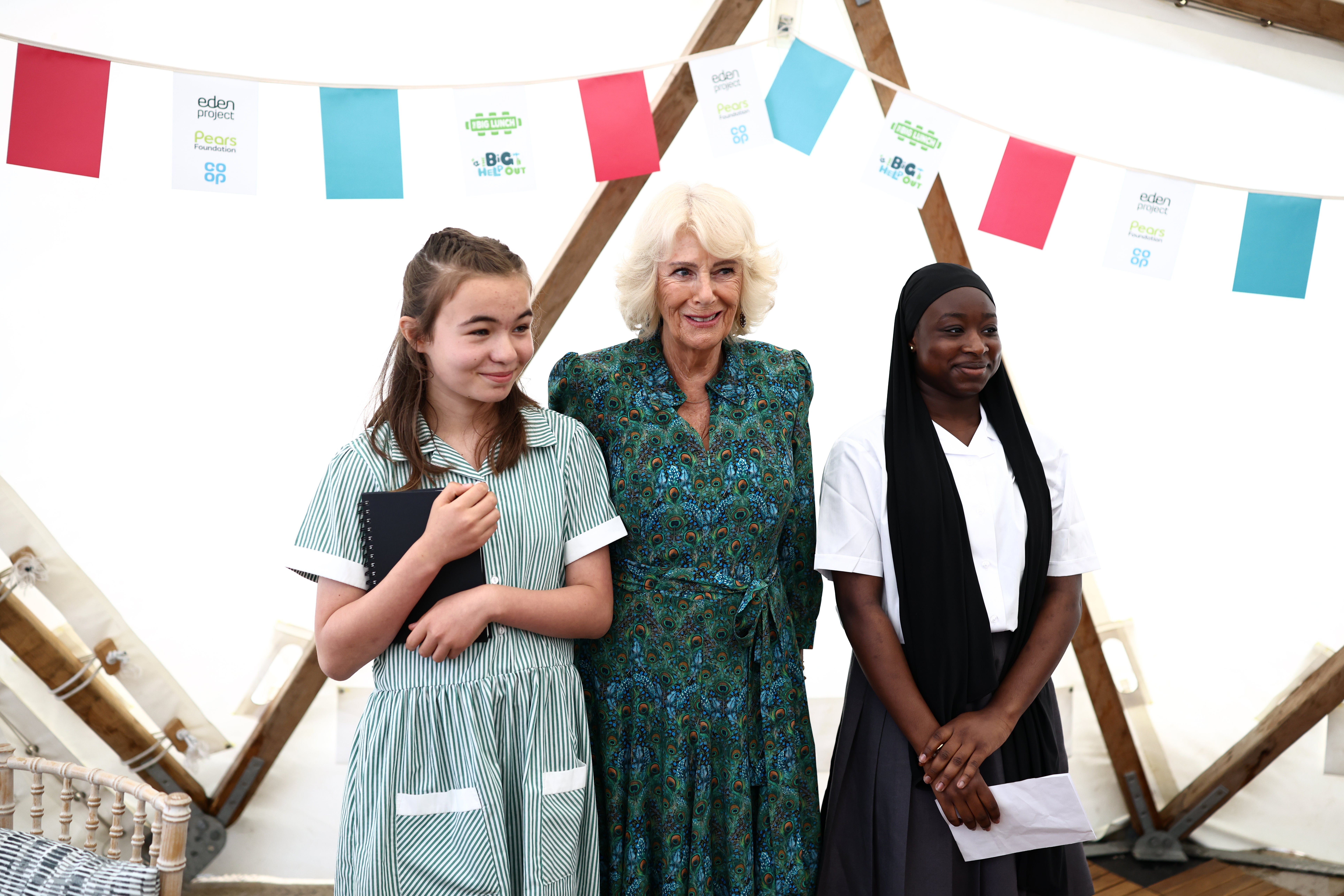 Camilla posed for a picture with London’s newly appointed Young Poet Laureates (Henry Nicholls/PA) (PA Wire)