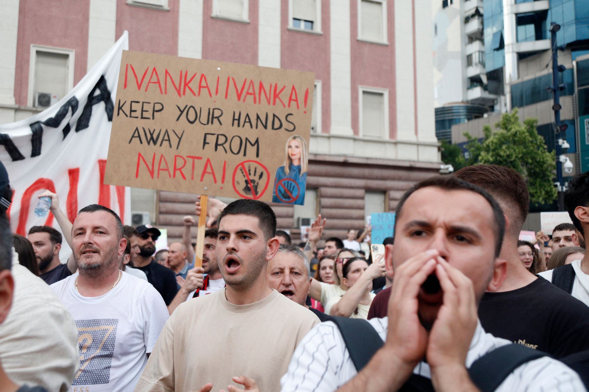 Protestors take part in a demonstration in front of the prime minister's office, against the construction of a luxury resort near a protected natural area, in Tirana on June 3, 2026