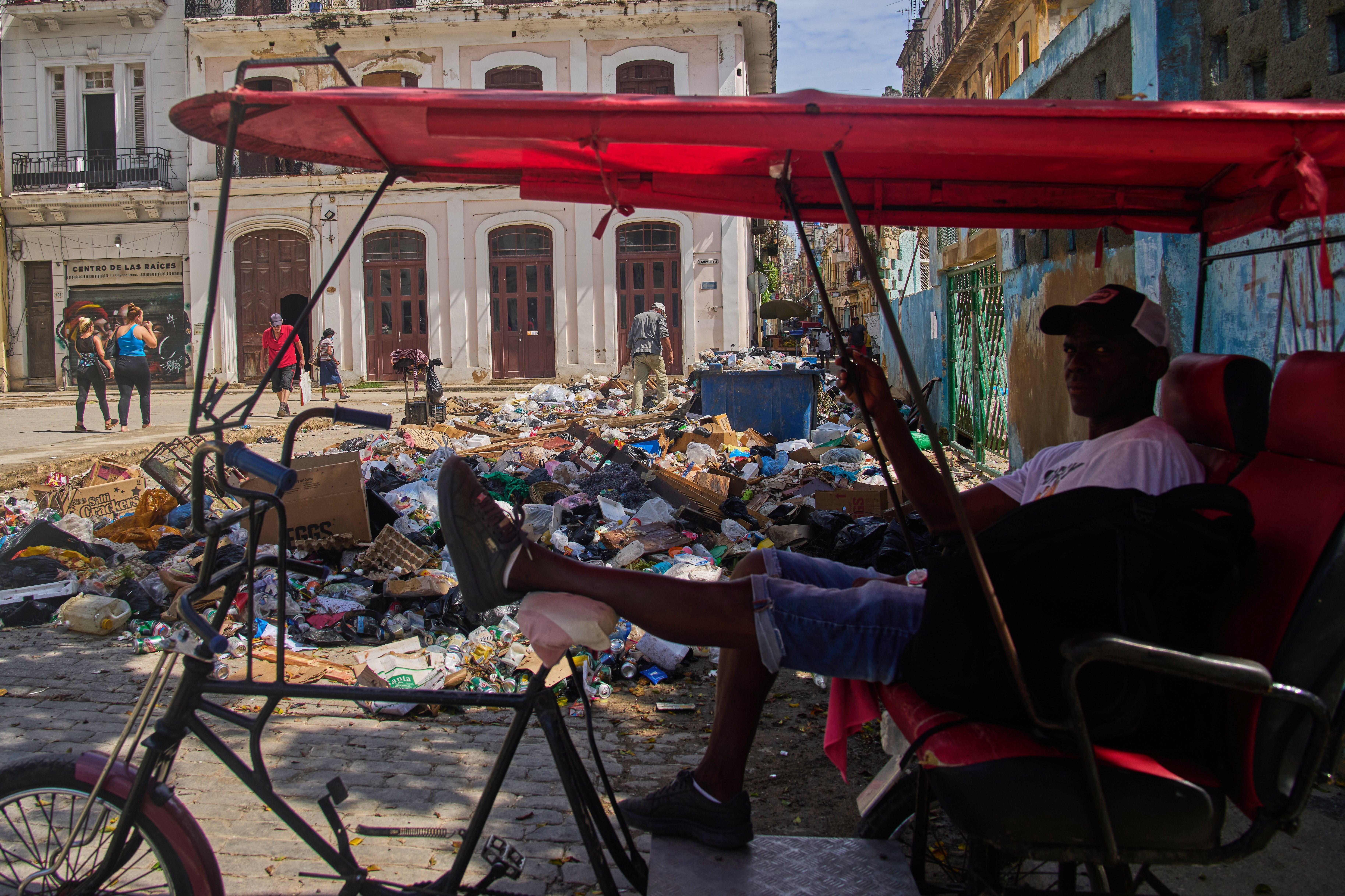 The situation deteriorated after a U.S. energy blockade triggered power outages, water shortages and a fuel crisis that brought state-run garbage trucks to a standstill