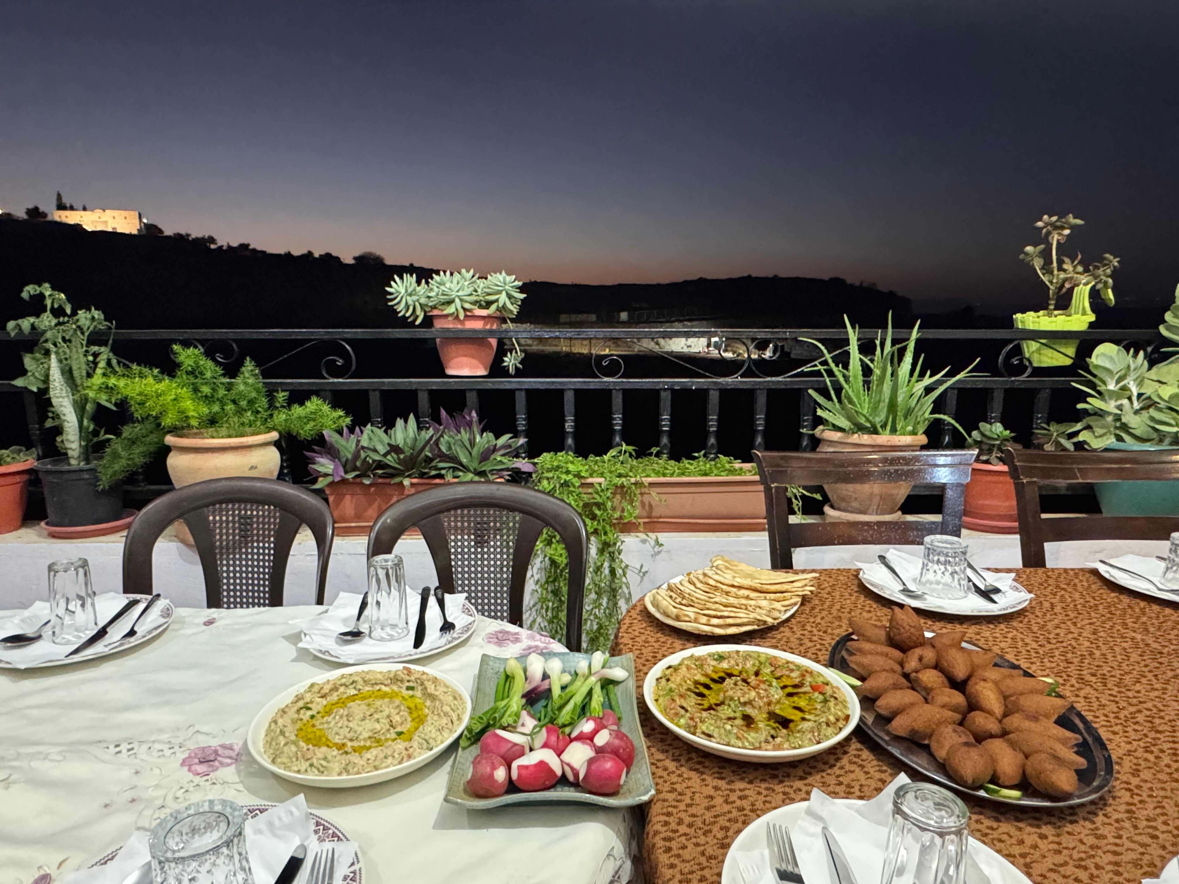 Dinner is served on the balcony at Rufaida and Maher Kiwan's house