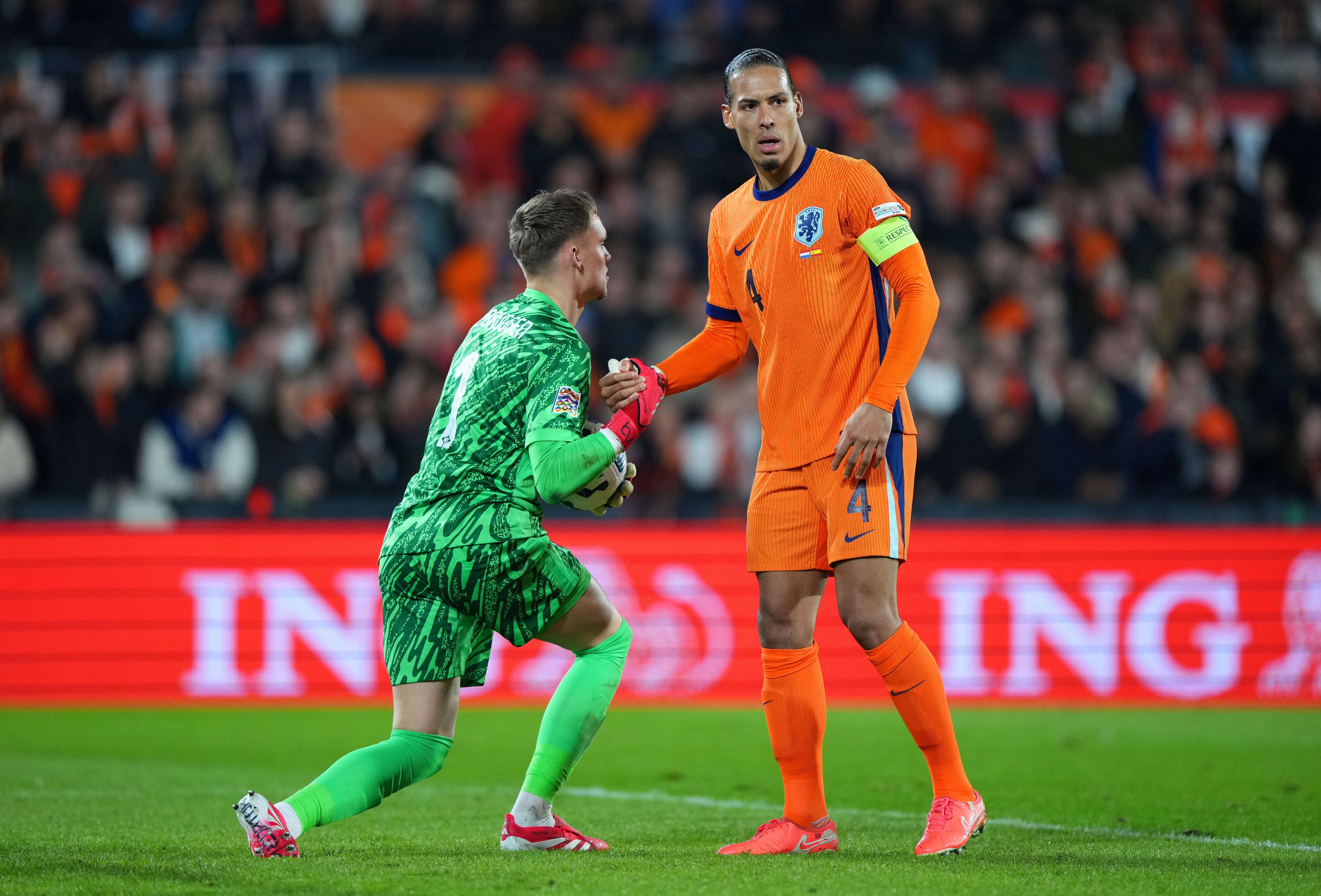 Bart Verbruggen and Virgil van Dijk in action during last year's Nations League