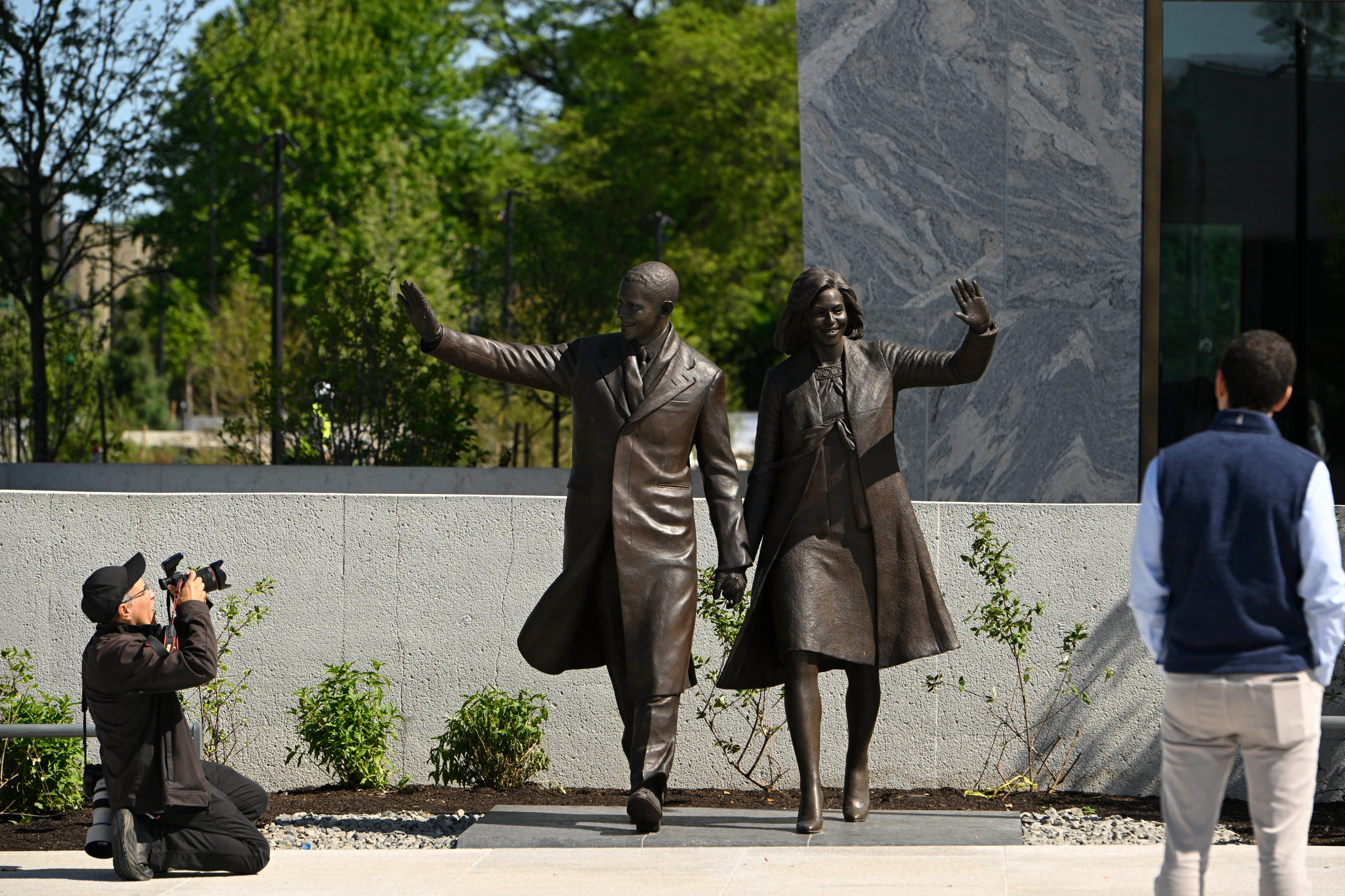 Statues of former President Barack Obama and former First Lady Michelle Obama at the Obama Presidential Center