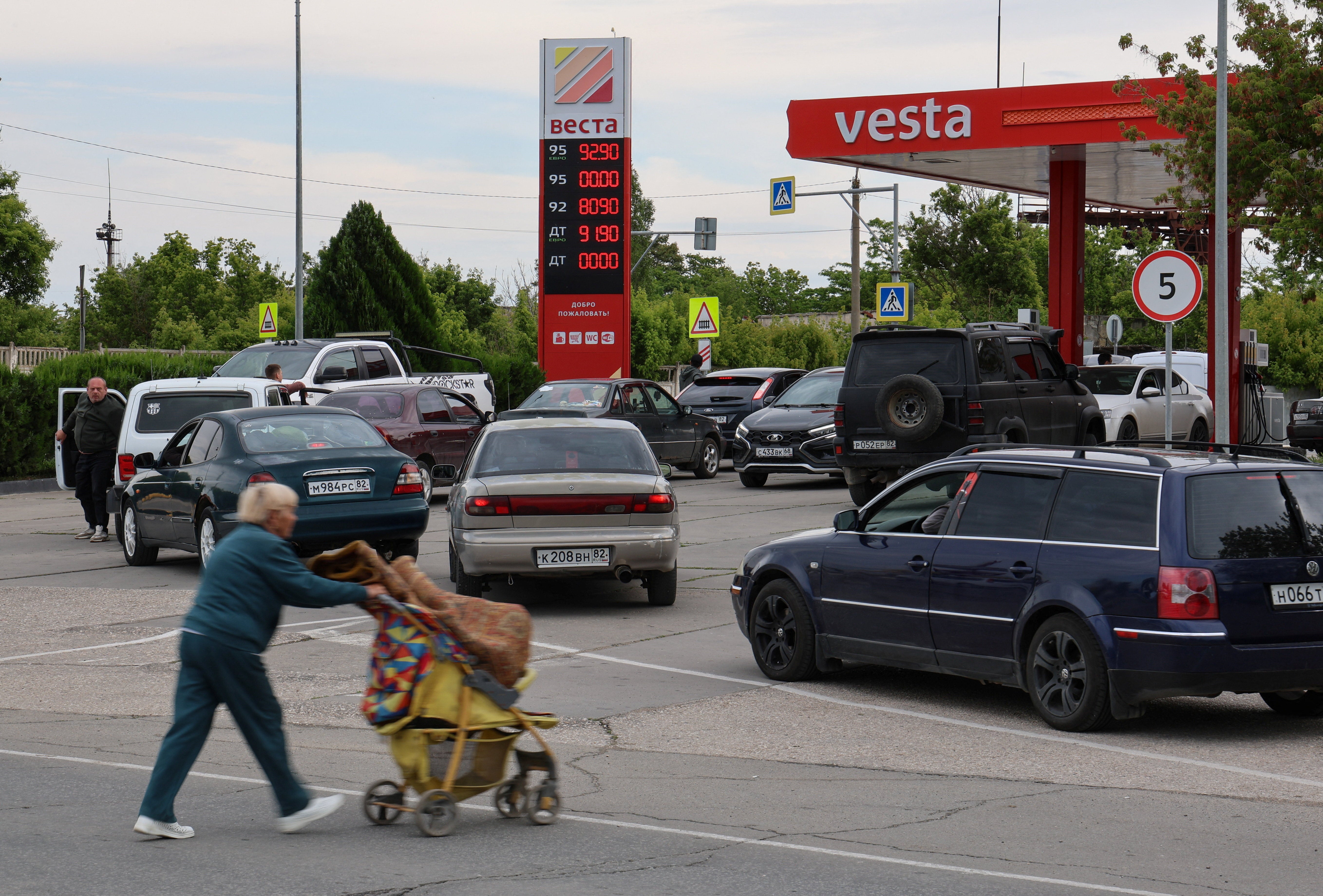 Cars queue for fuel at a gas station in Crimea