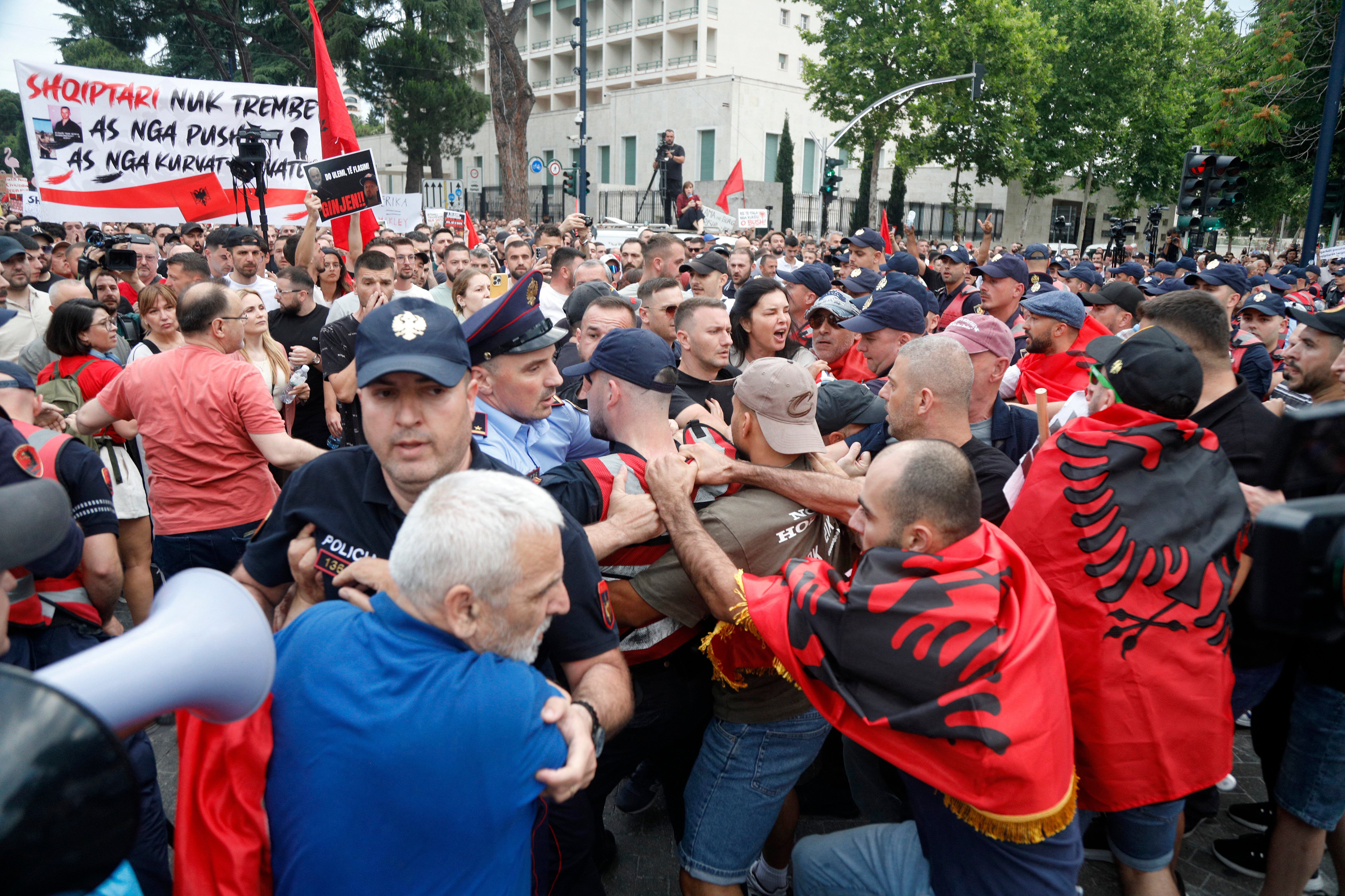 Protestors clash with police during a demonstration in front of the prime minister’s office on Wednesday
