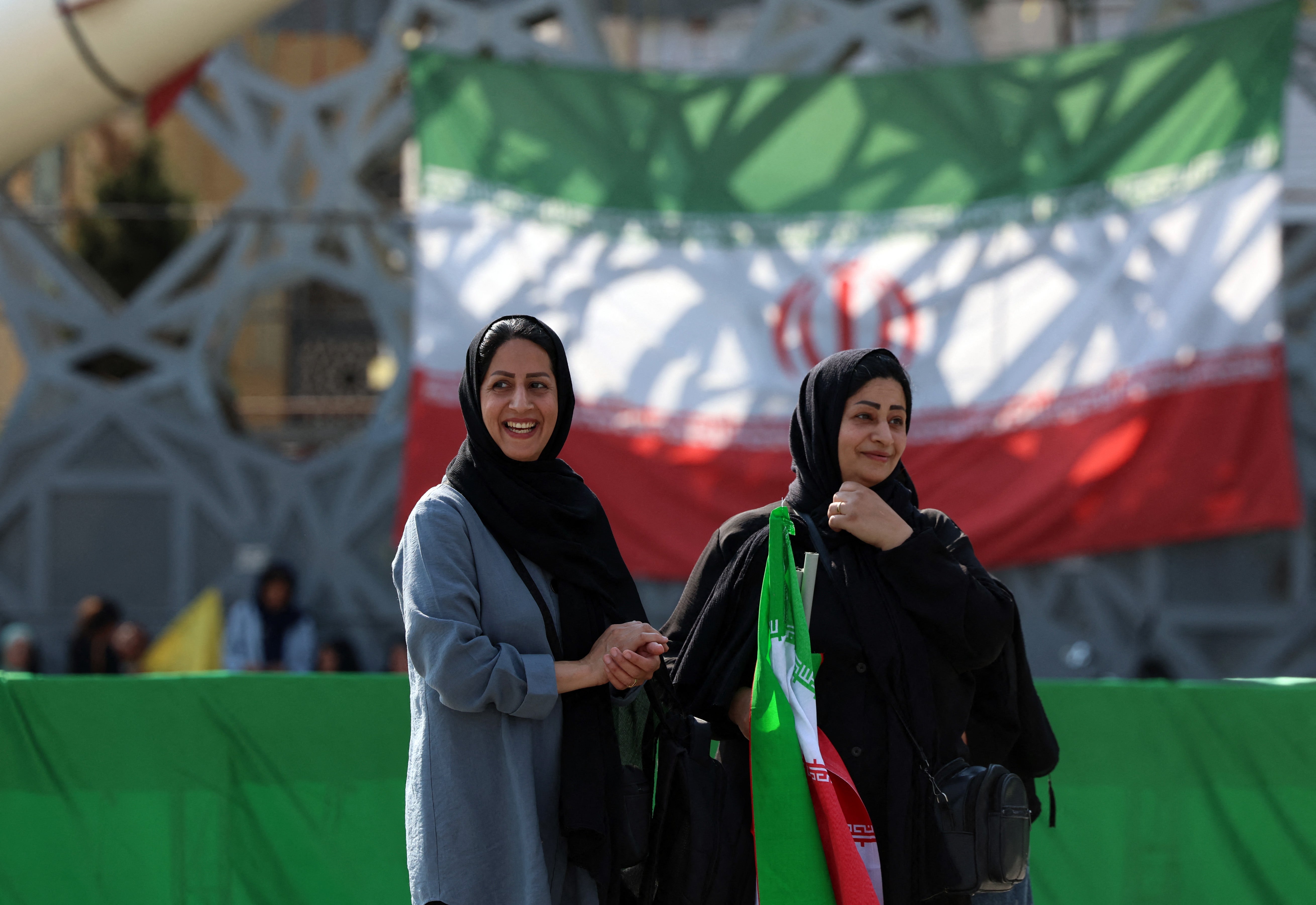 Iranian women take part during a rally in support of the country's supreme leader Mojtaba Khamenei and commemorate Eid al-Ghadir in Tehran (AFP/Getty)
