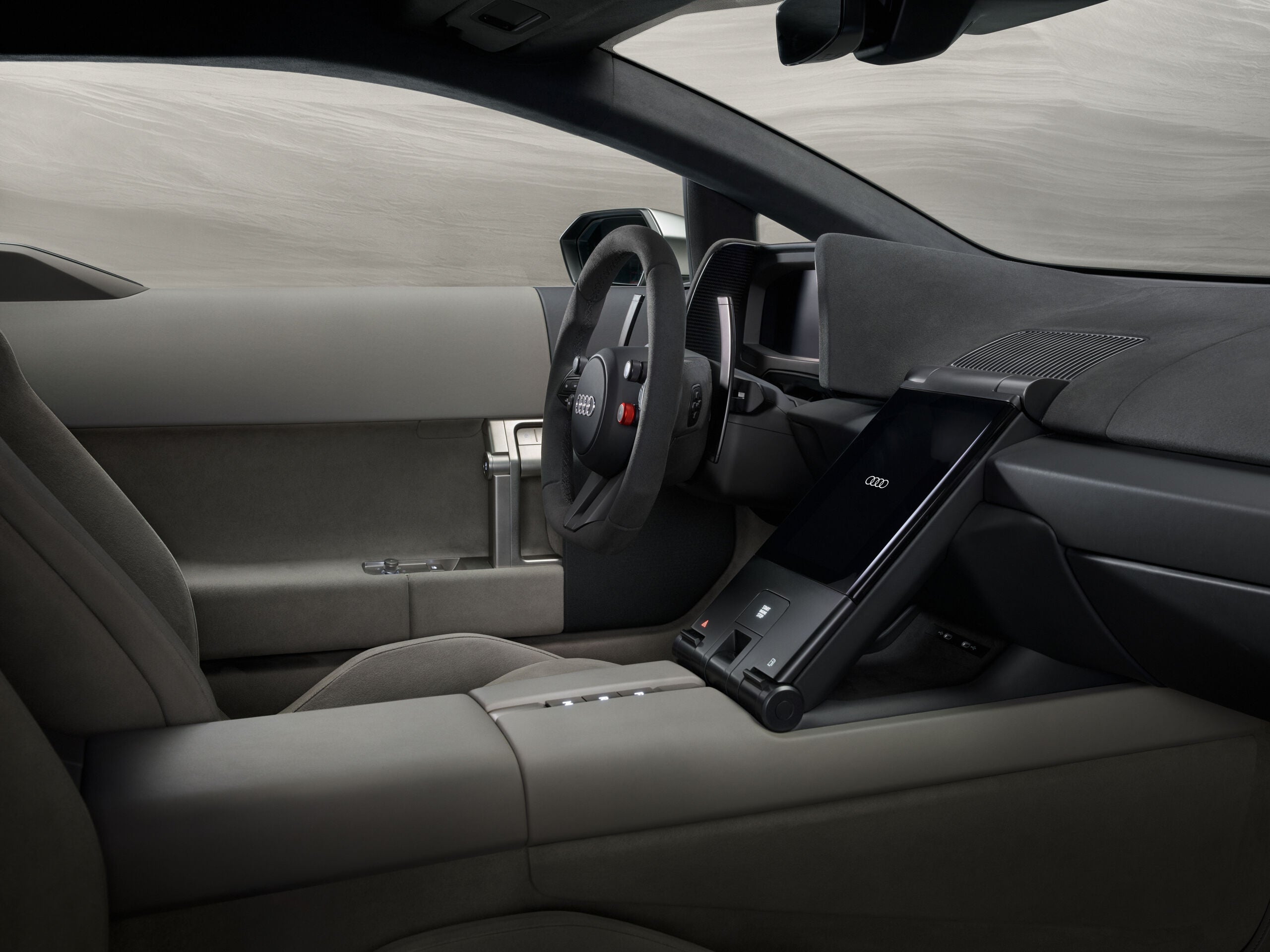 The minimalist interior of the Audi Nuvolari uses darker materials at the front to help concentration (Audi)