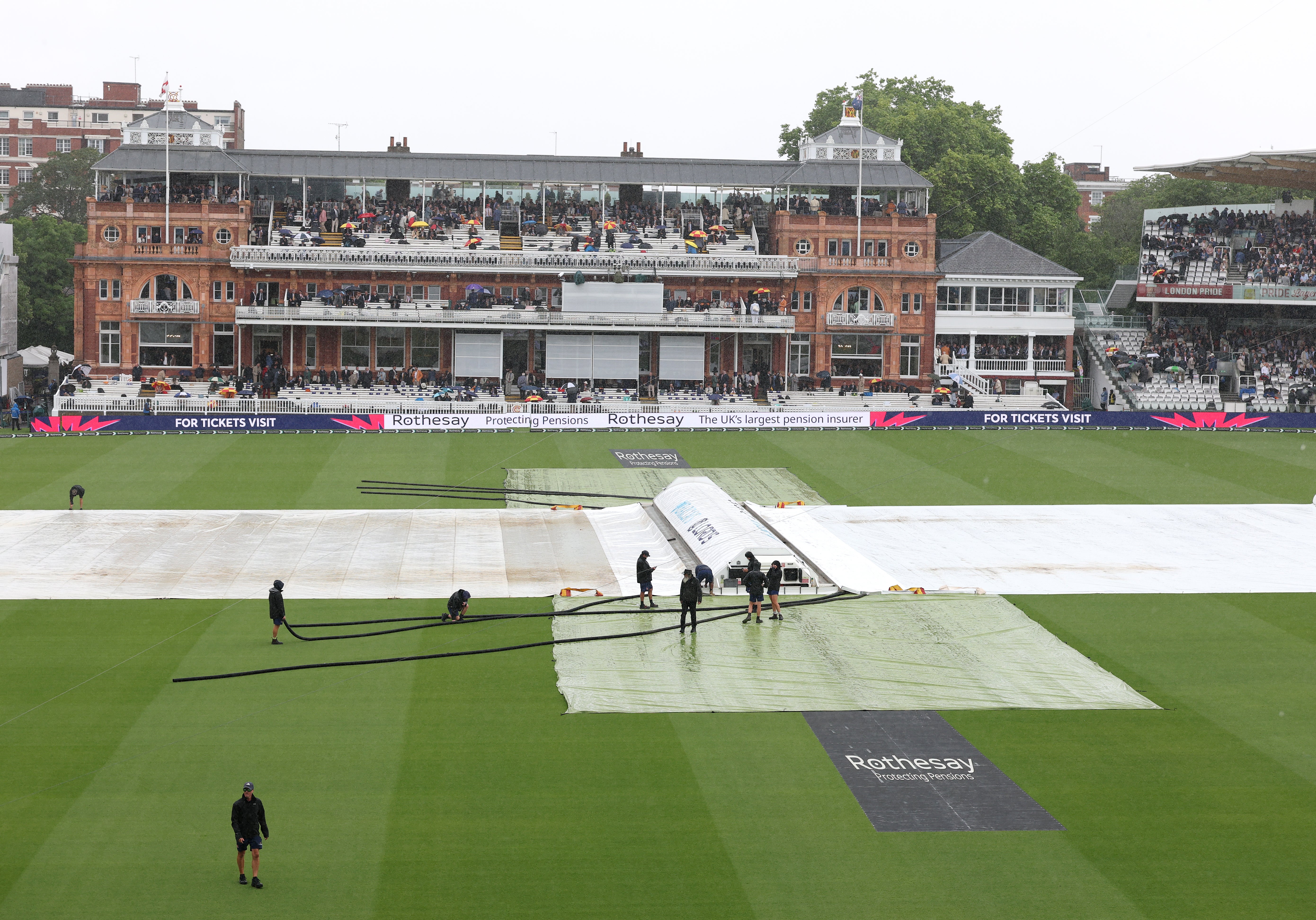 Rain twice interrupted the opening day of the English Test summer at Lord's