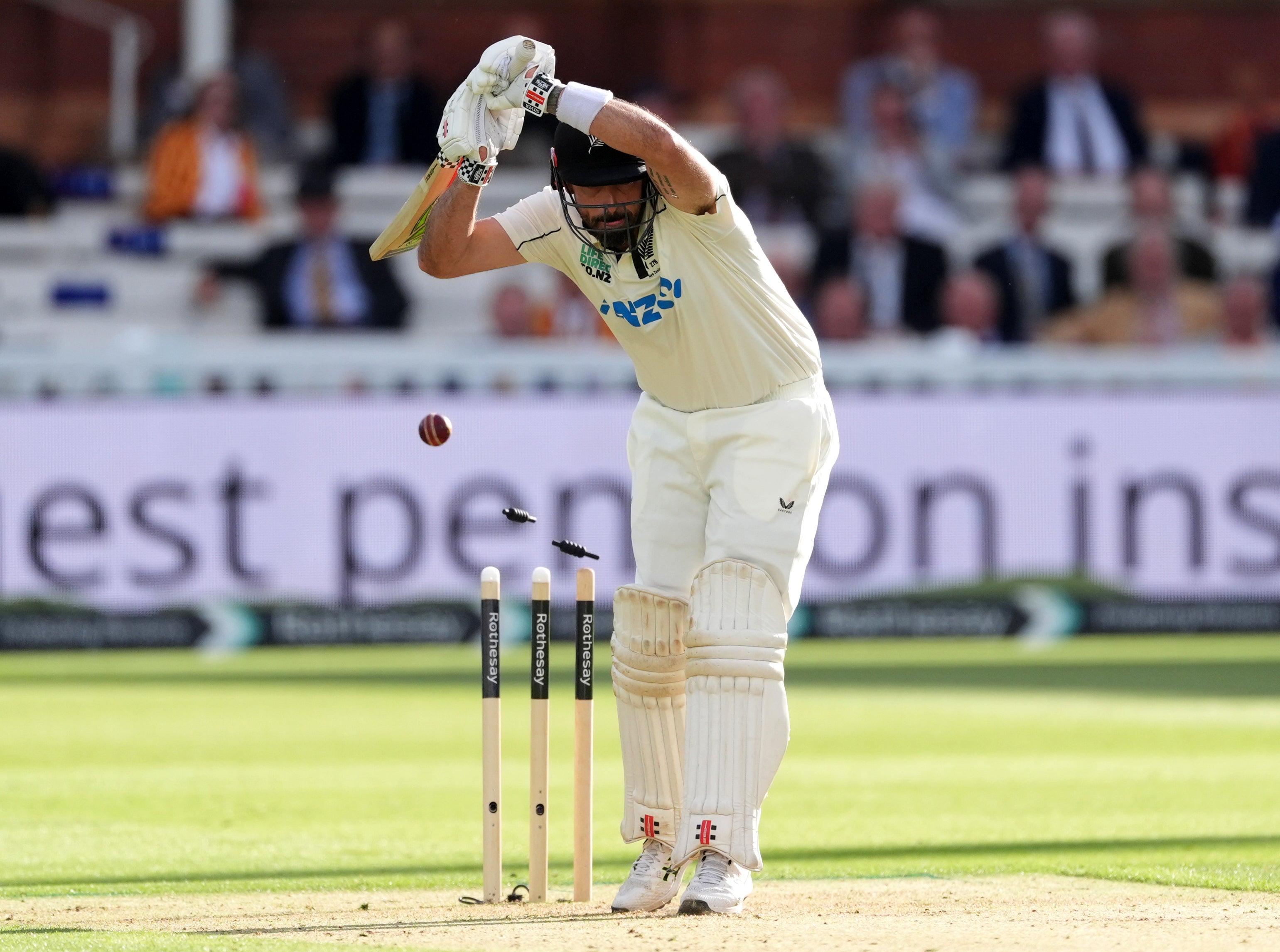 Daryl Mitchell is bowled by Ollie Robinson (Ben Whitley/PA)