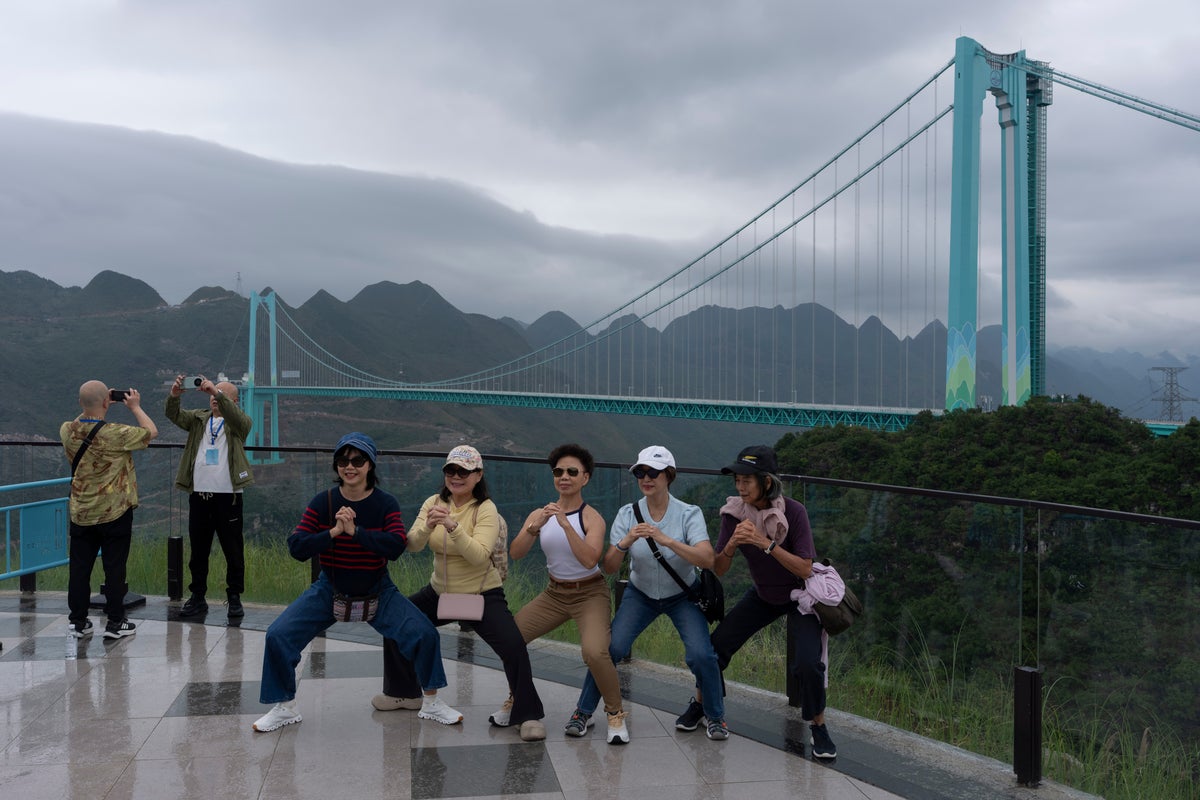 China’s highest bridge brings tourists and internet access to remote communities, in photos – UK Times