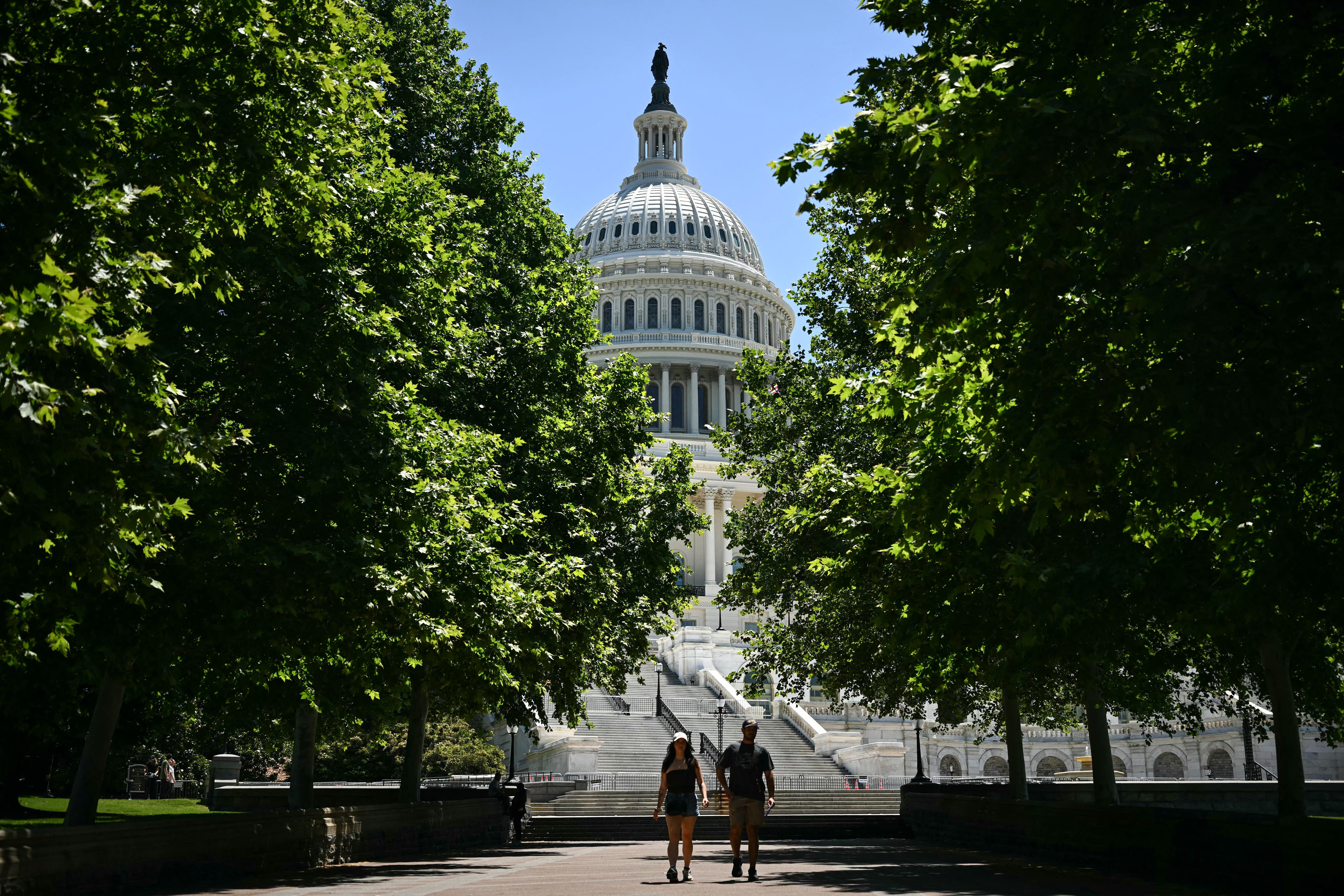 People walk outside the US Capitol in Washington, DC, on June 4, 2026