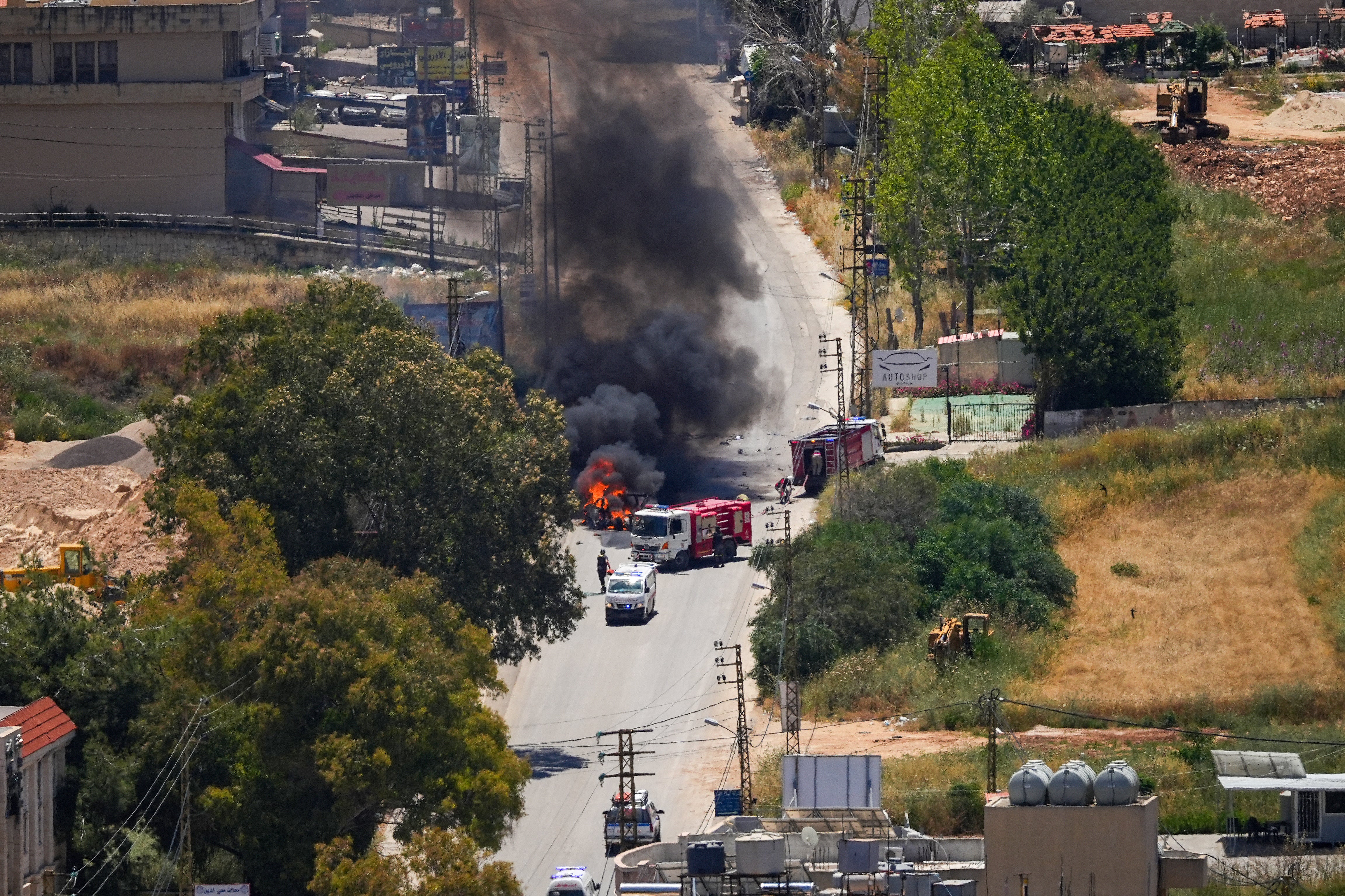 First responders attend to a burning vehicle targeted by an Israeli drone attack in the southern Lebanese city of Nabatieh on June 5, 2026. Israeli strikes overnight in the south Lebanon city of Tyre killed seven people, a source from Lebanon's civil defence told AFP on June 5, despite a ceasefire in the Israel-Hezbollah war. (AFP/Getty)