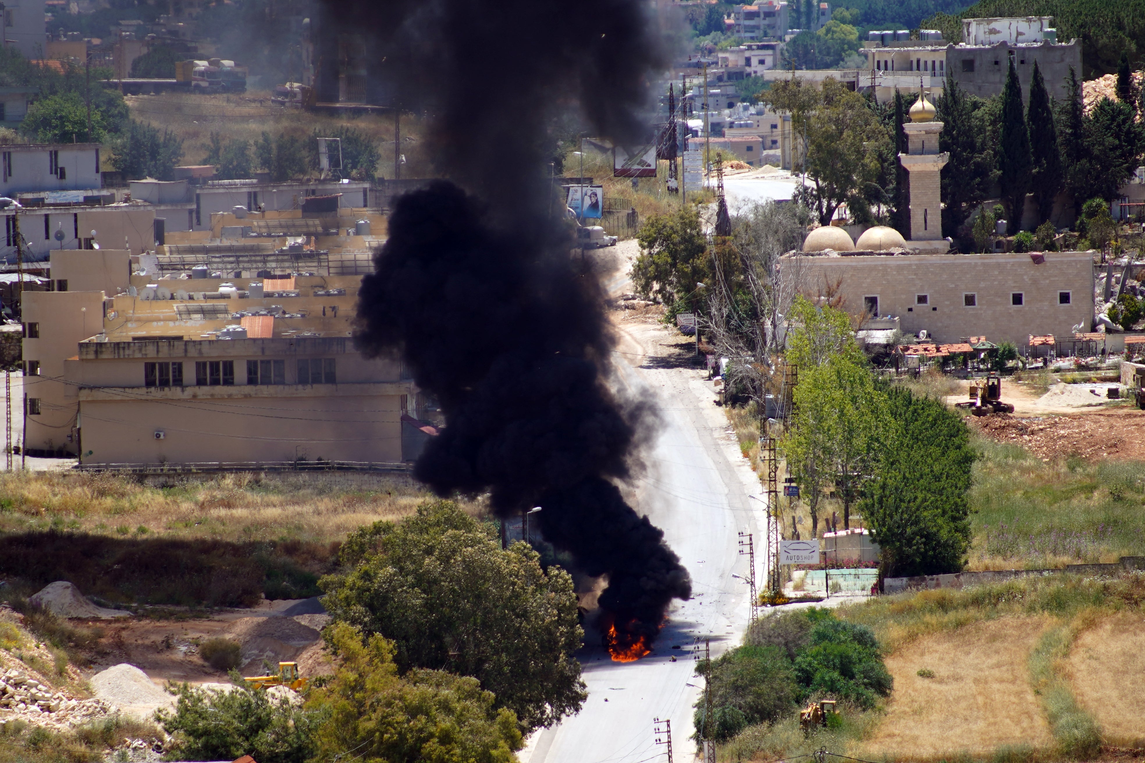 Smoke rises from a vehicle targeted by an Israeli drone attack in the southern Lebanese city of Nabatieh on June 5, 2026. Israeli strikes overnight in the south Lebanon city of Tyre killed seven people, a source from Lebanon's civil defence told AFP on June 5, despite a ceasefire in the Israel-Hezbollah war. (AFP/Getty)