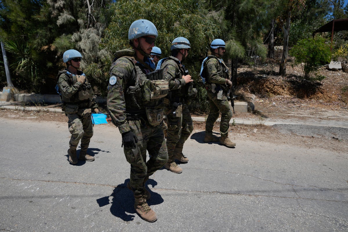 Photos show Lebanese and UN troops take positions in a village vacated by Israeli soldiers – UK Times