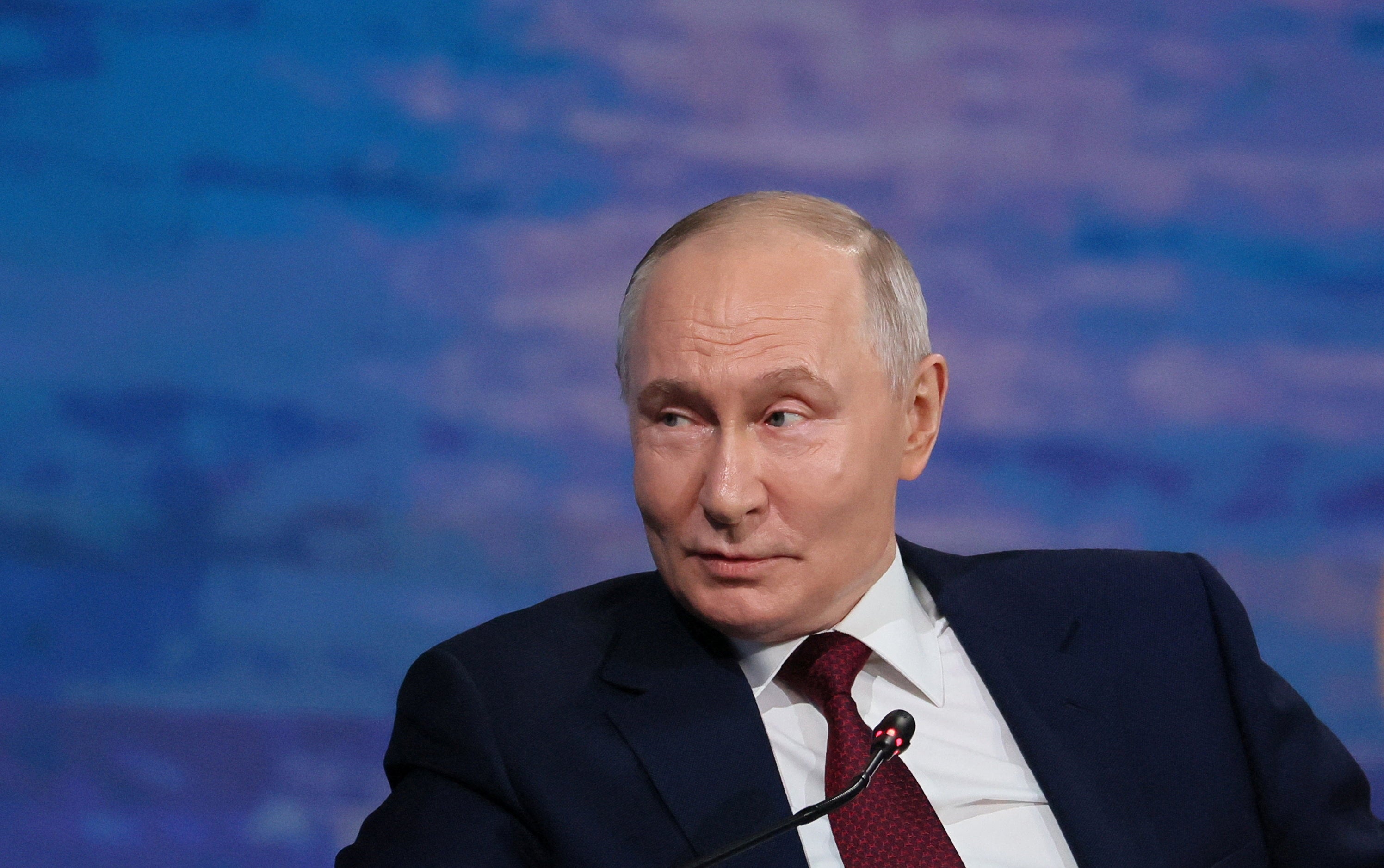 Russia's President Vladimir Putin attends a plenary session of the St. Petersburg International Economic Forum (SPIEF) (Reuters)