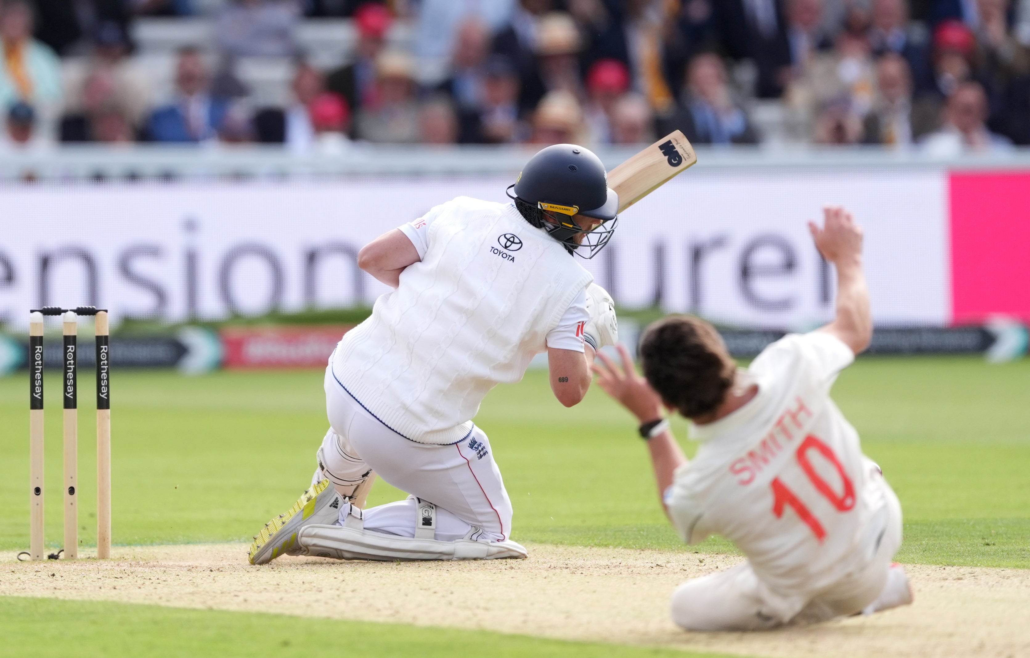 Ollie Robinson in action as New Zealand’s Nathan Smith falls whilst bowling (Ben Whitley/PA) (PA Wire)