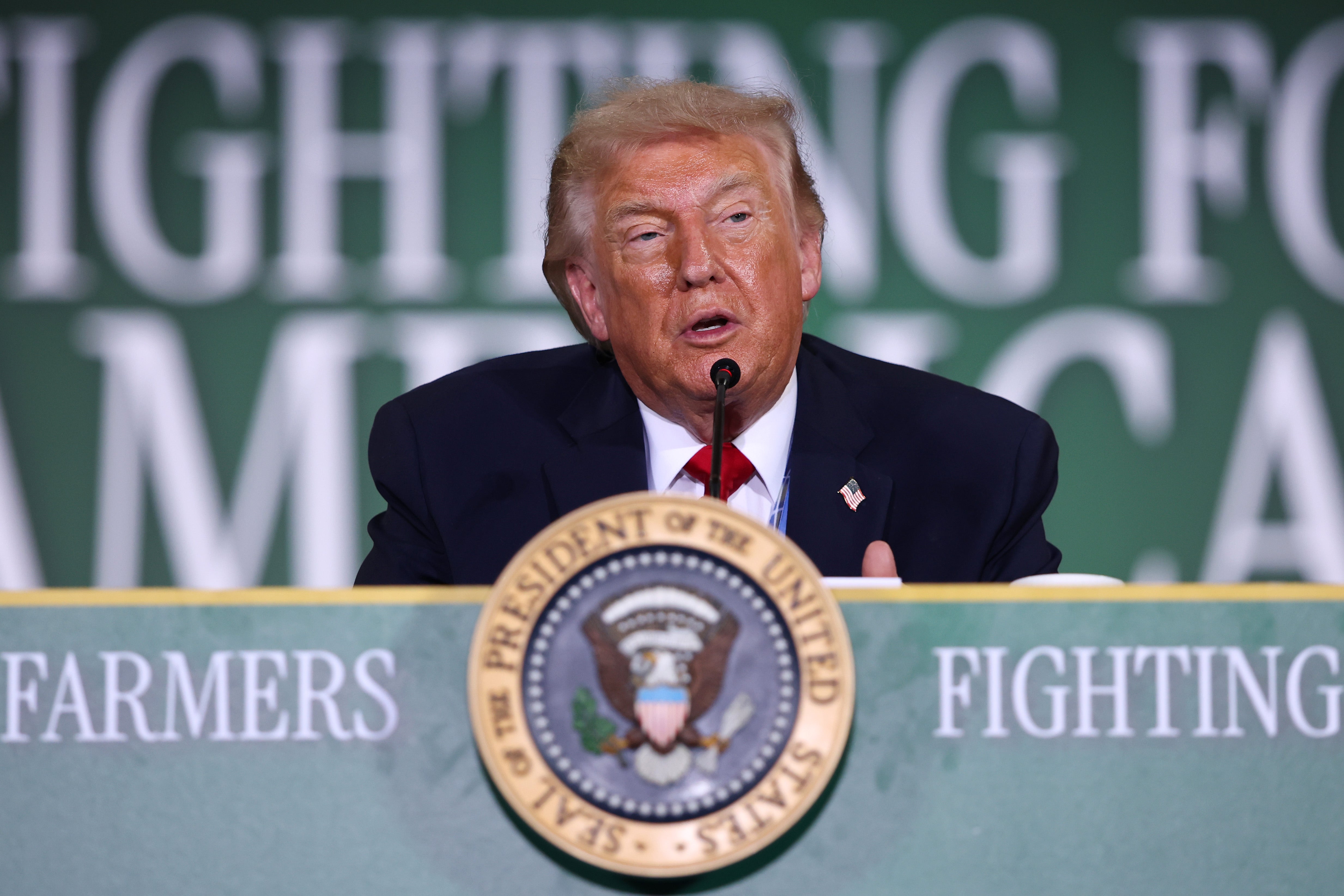 President Donald Trump has traveled to Wisconsin for a roundtable event where he rambled through his administration’s agenda and showed farmers printed pictures of his Lincoln Memorial reflecting pool project