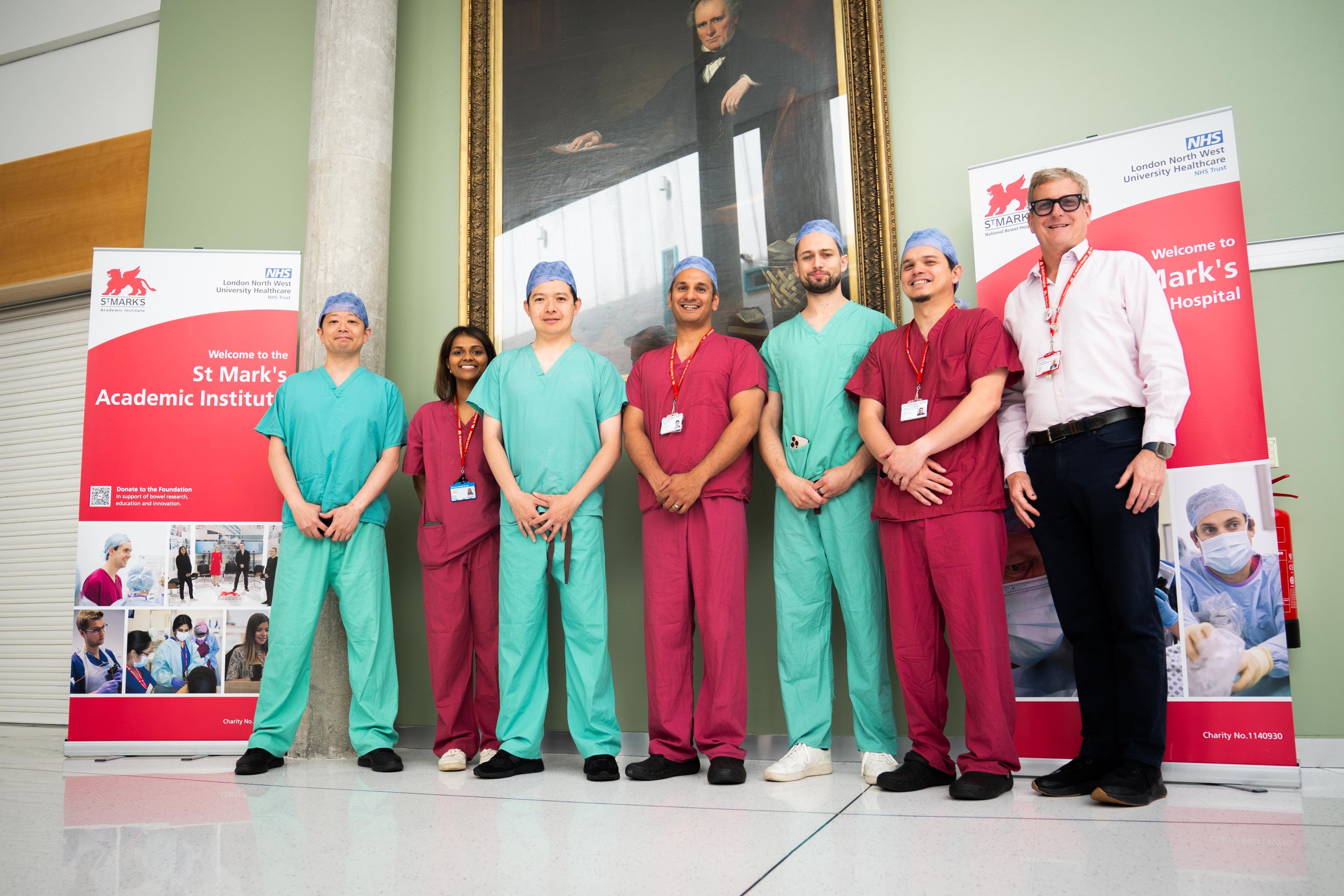 Surgeon Kapil Sahnan (centre) with surgeons and technicians ahead of the operation (James Manning/PA) (PA Wire)