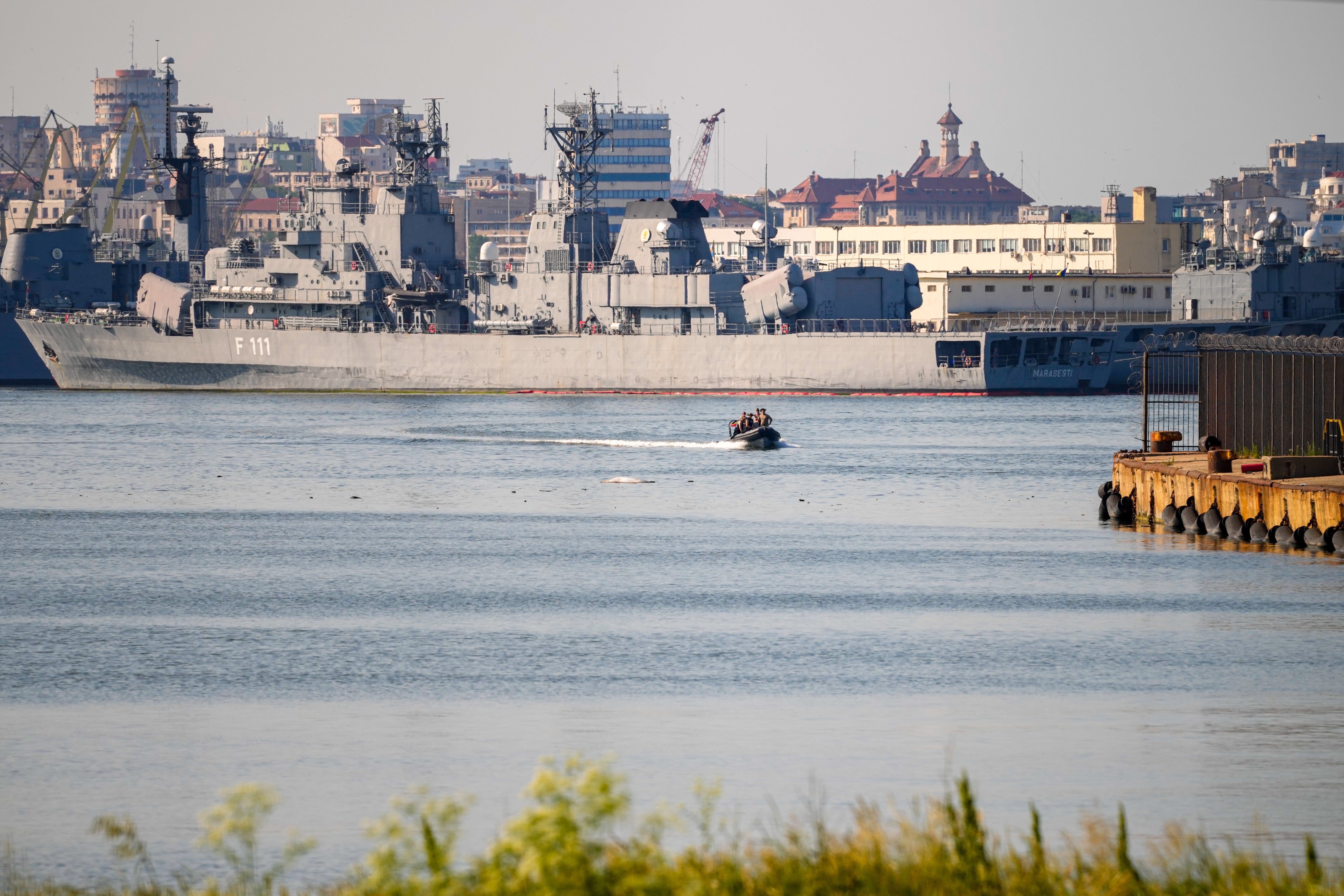 A small military patrol boat sails past the Romanian frigate Marasesti docked in the military port of Constanta following the explosion of a maritime drone in the Black Sea port of Constanta, Romania, Friday, 5 June 2026