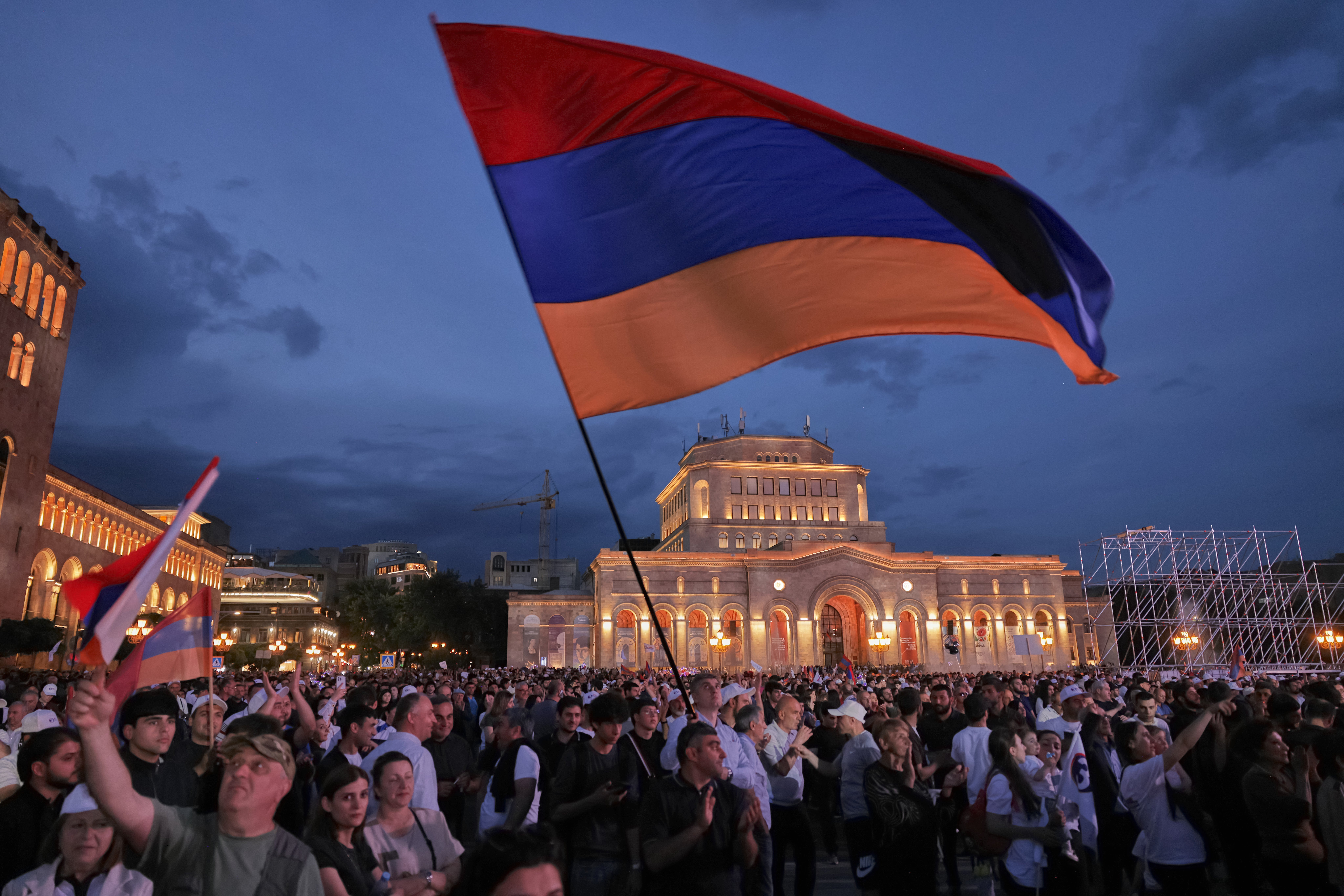 Supporters of Russian-Armenian tycoon Samvel Karapetyan, wave a Armenian national flag during a rally against incumbent Prime Minister Nikol Pashinyan at Republic Square in Yerevan, Armenia, Wednesday, 3 June 2026