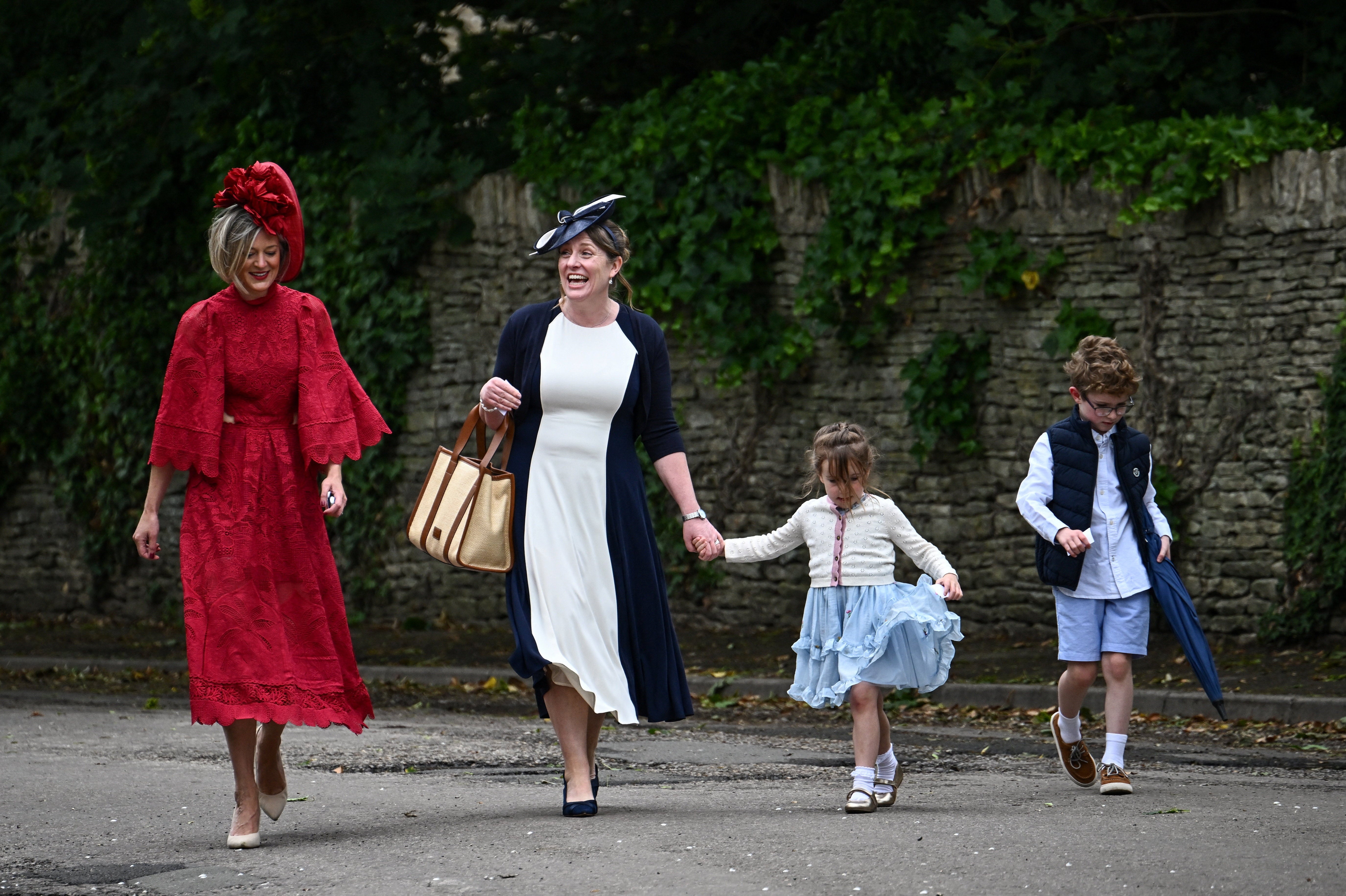 Guests arrive to attend the wedding of Princess Anne's son, Peter Phillips and Harriet Sperling at All Saints' Church in Kemble