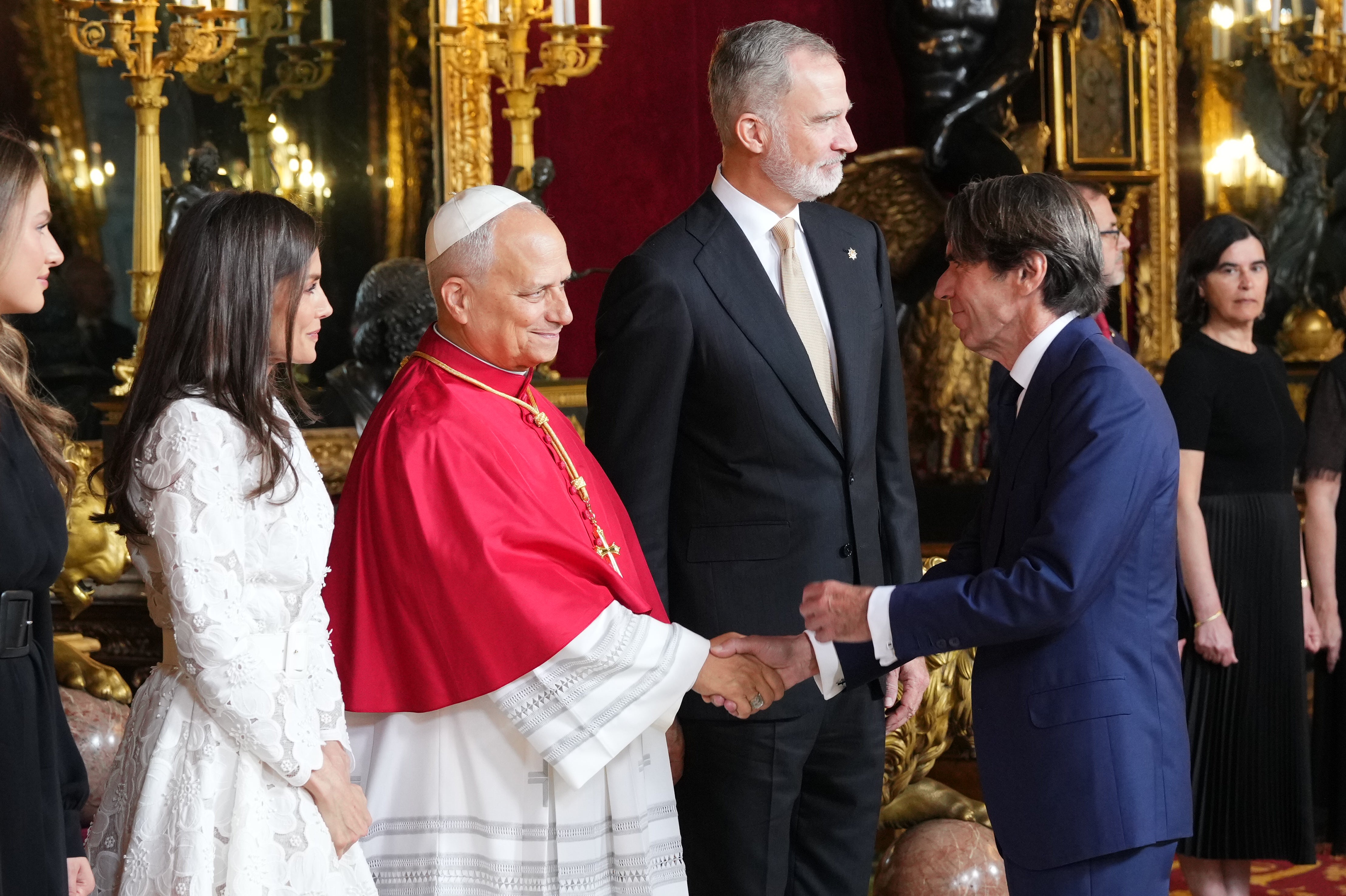 Pope Leo XIV shakes hands Jose Maria Aznar former Prime Minister of Spain, as he meets with King of Spain Felipe VI Queen Letizia, and Leonor, Princess of Asturias, and Infanta Sofia at the at the Royal Palace in Madrid, Saturday, June 6, 2026, on the occasion of his Apostolic journey to Spain