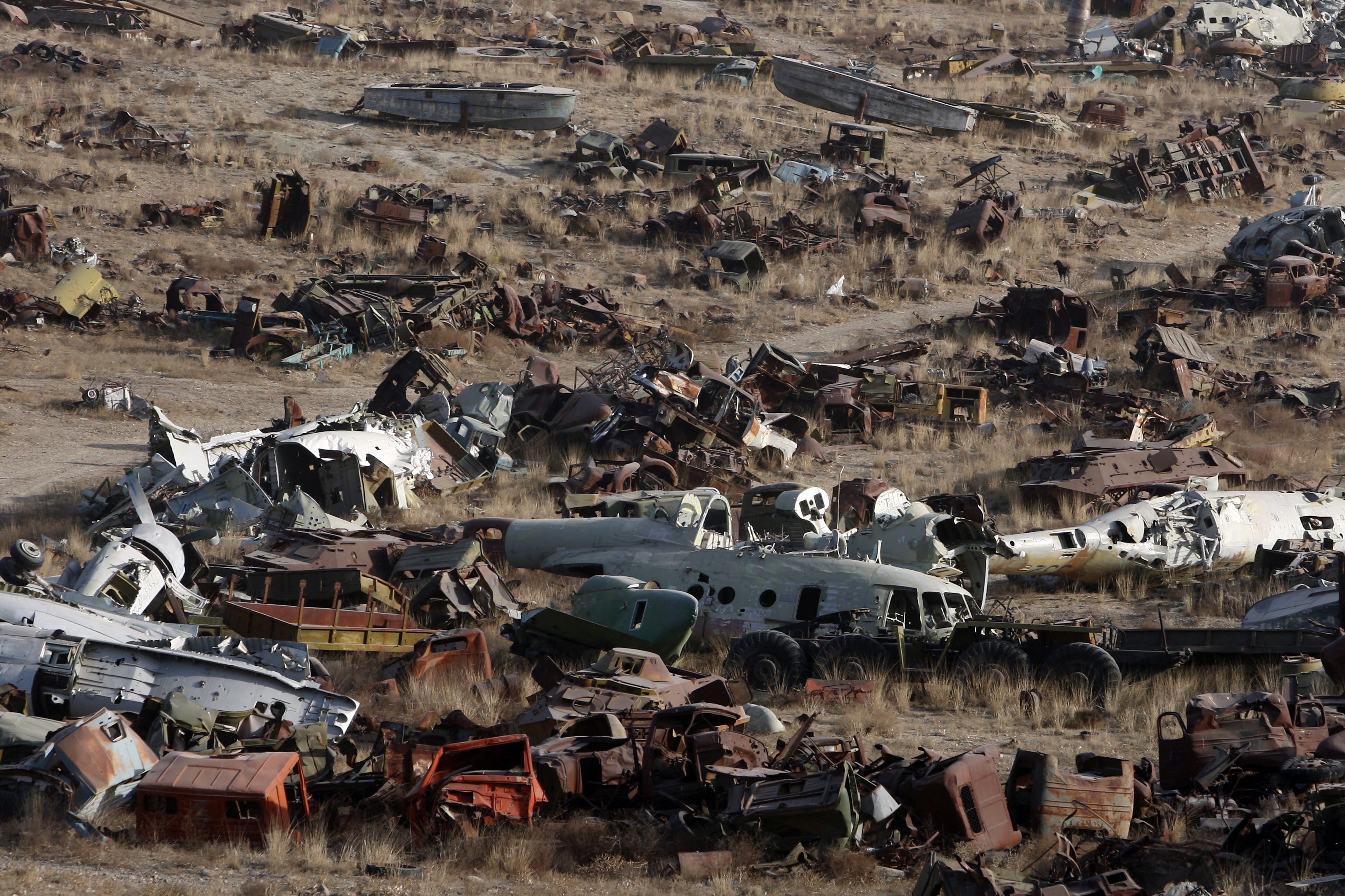 A general overview of a junkyard of Soviet armoured vehicles, planes and tanks at the Kabul Military Training Camp (AFP/Getty)