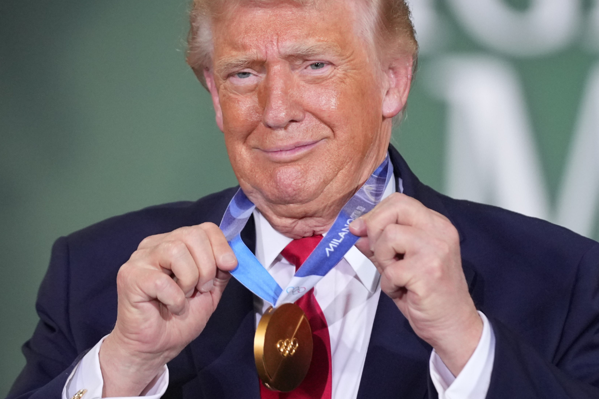 ‘I am keeping it’: Donald Trump jokes with Olympic speed skater after wearing his gold medal