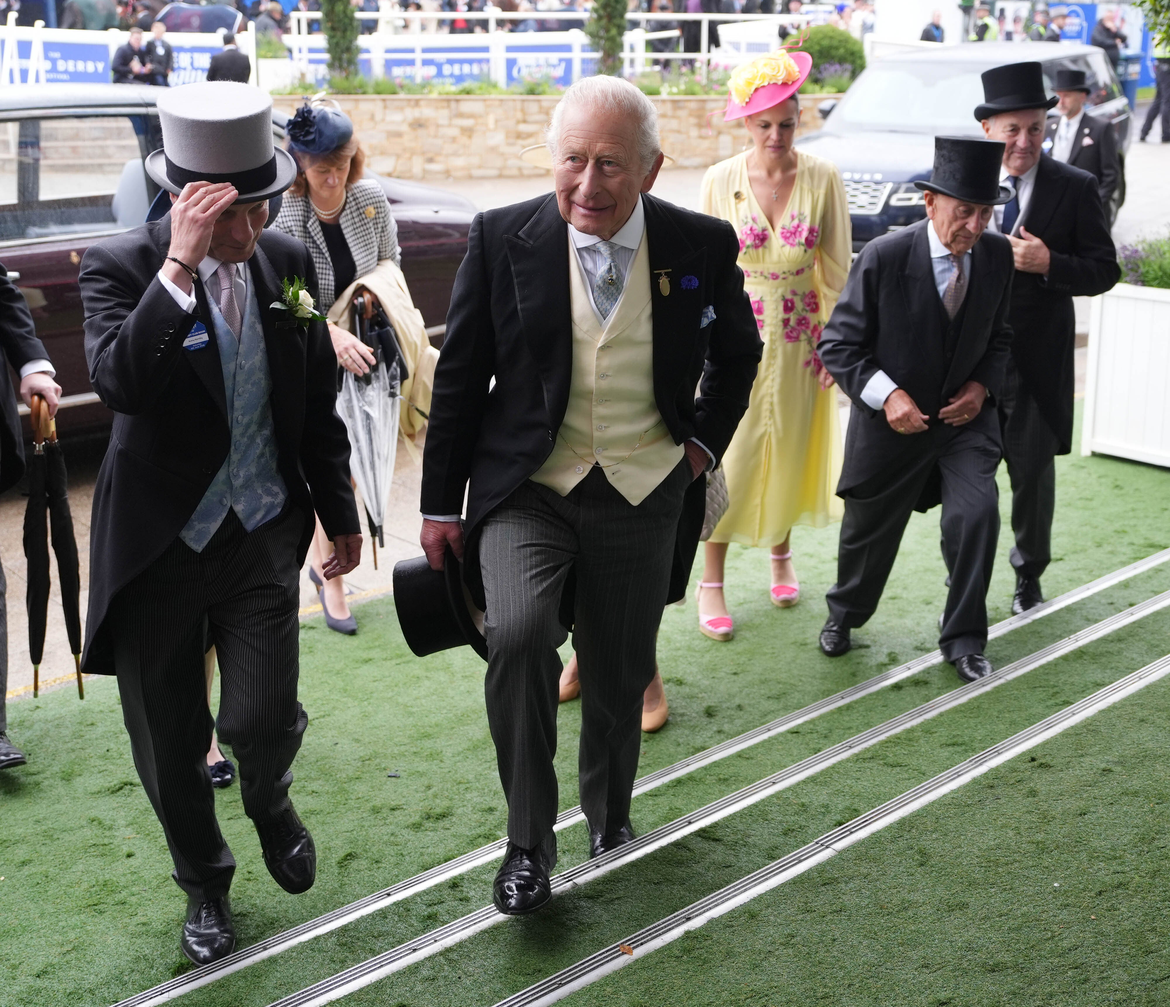 The King arriving for Derby Day at Epsom Downs Racecourse (Jonathan Brady/PA)