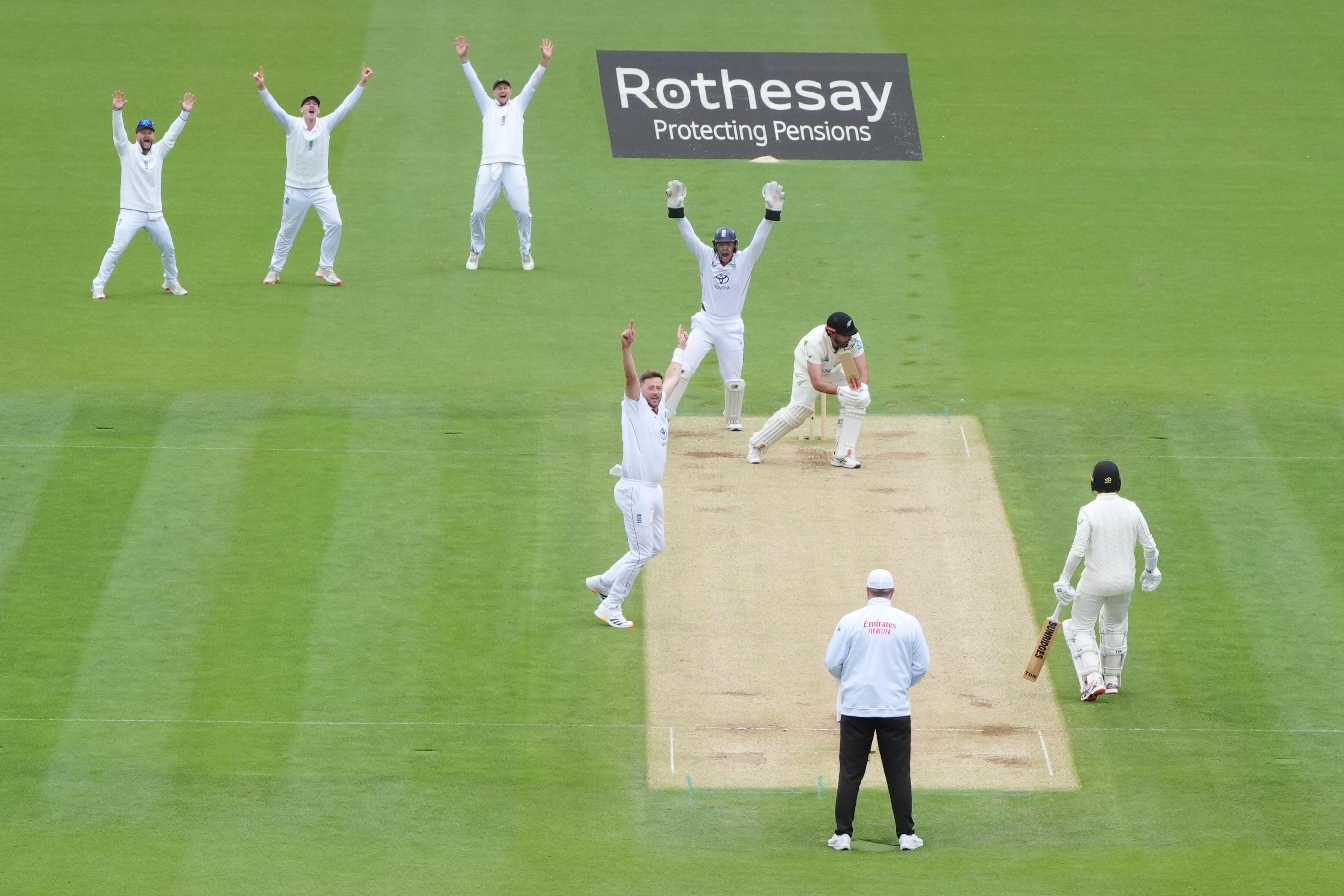 Daryl Mitchell was trapped LBW as England closed in on victory