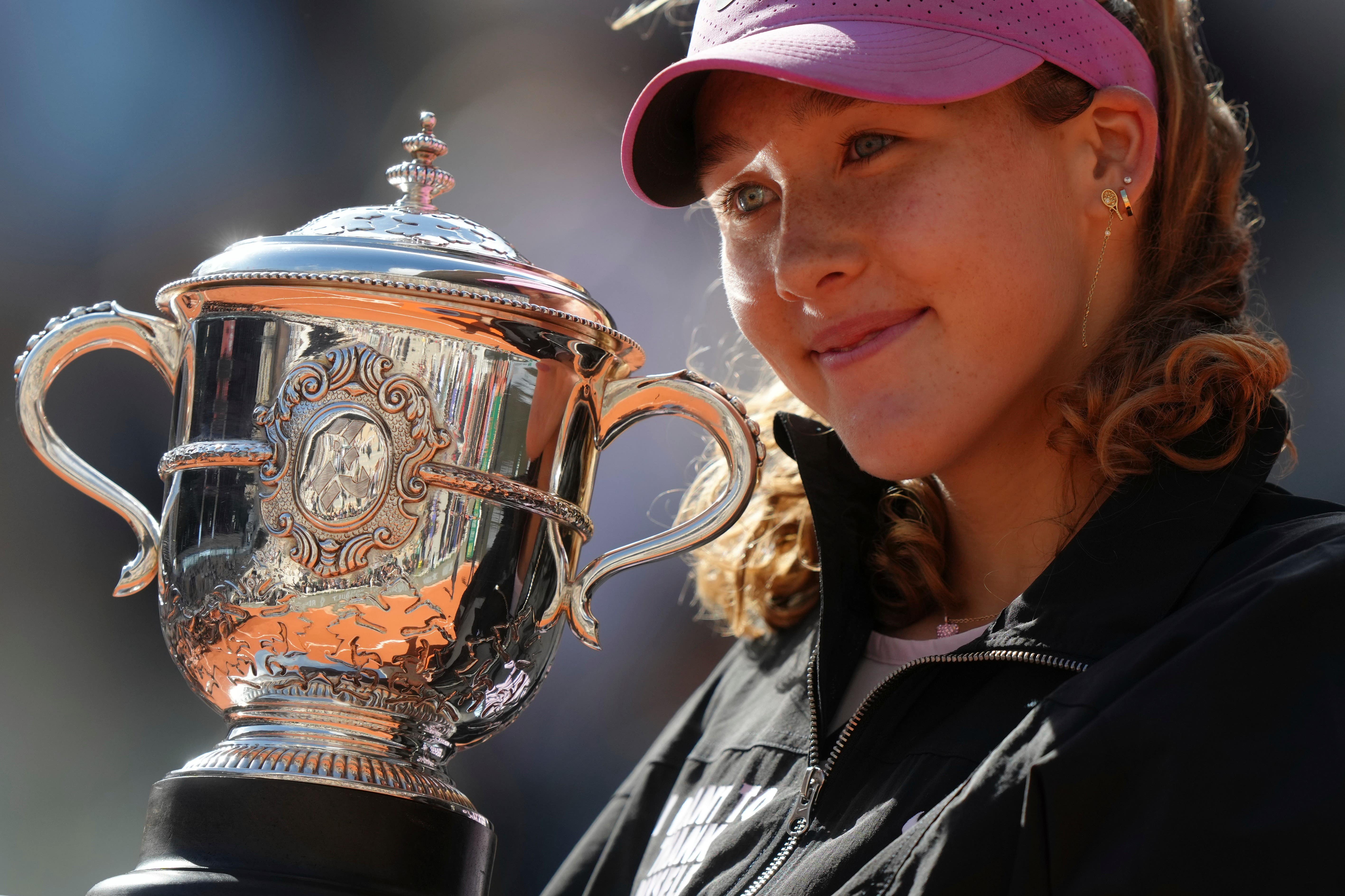 Mirra Andreeva poses with the French Open trophy (Aurelien Morissard/AP)