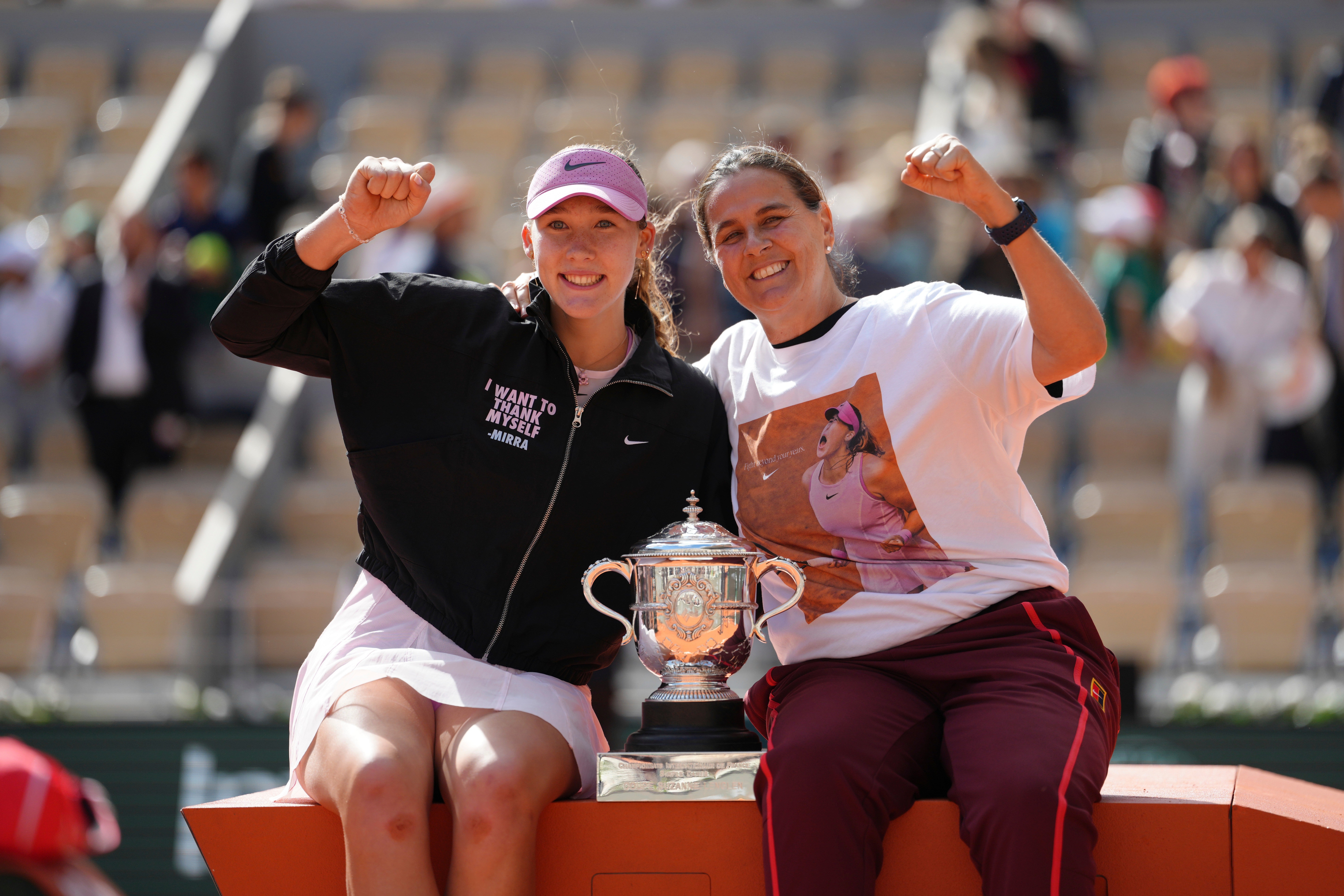 Mirra Andreeva, left, and her coach Conchita Martinez (Aurelien Morissard/AP)