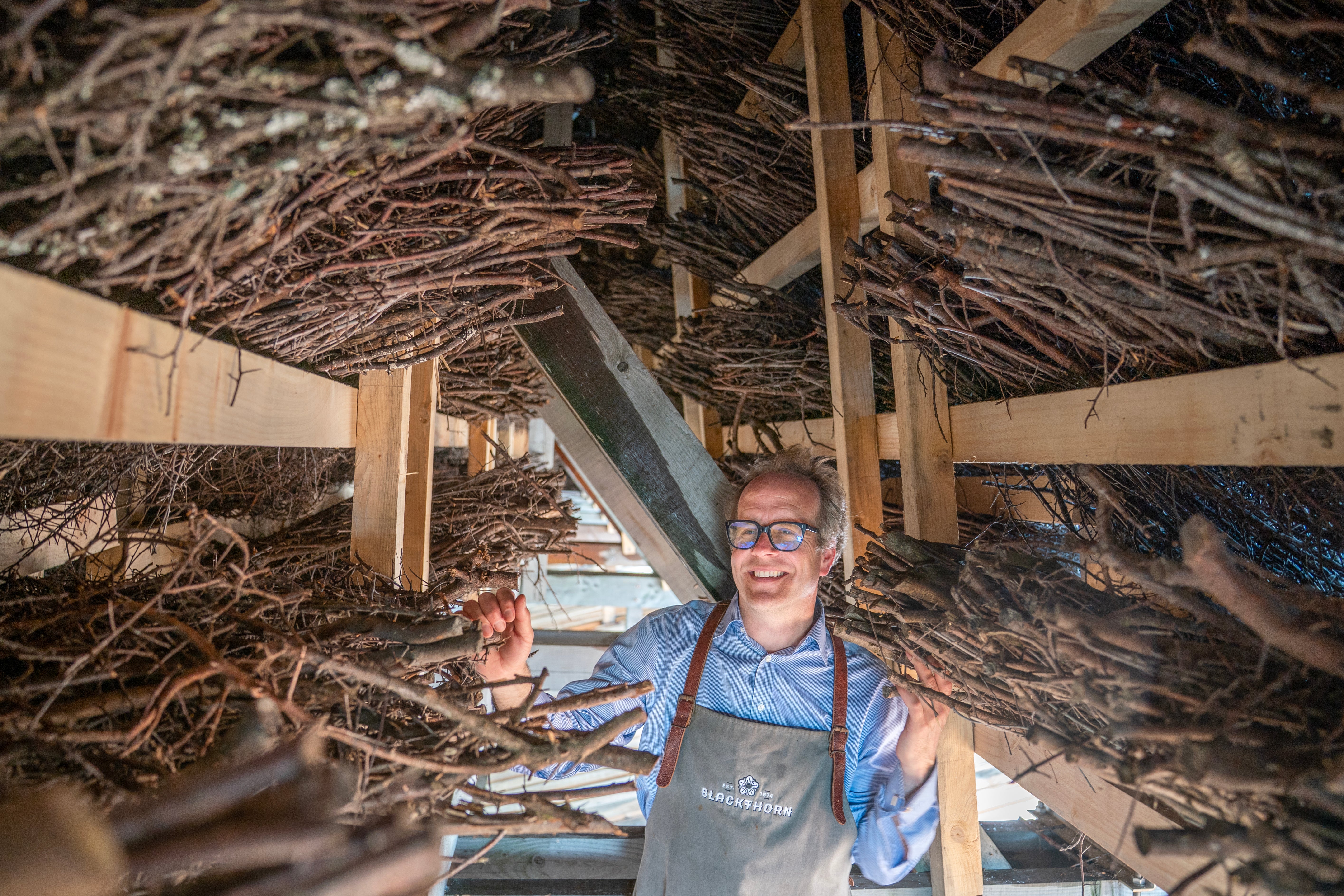 Master Salter and founder of Blackthorn Salt Gregorie Marshall underneath the A-frame of the new salt graduation tower on the coast at Ayr. Picture date: Friday June 5, 2026.
