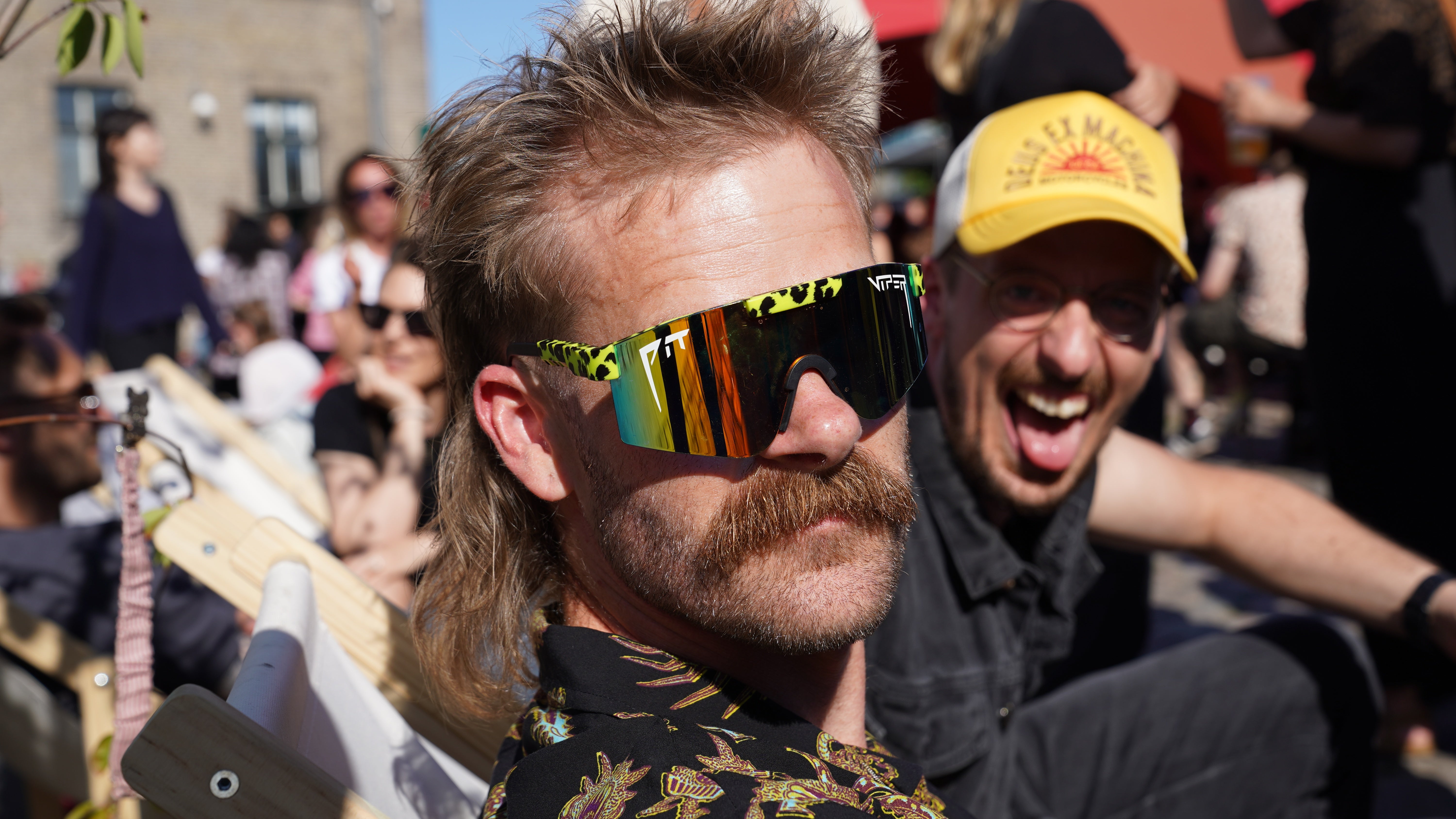 An attendee at Denmark's Mullet Championship looks on in Copenhagen, Saturday, June 6, 2026. (AP Photo/James Brooks) (Copyright 2026 The Associated Press. All rights reserved.)