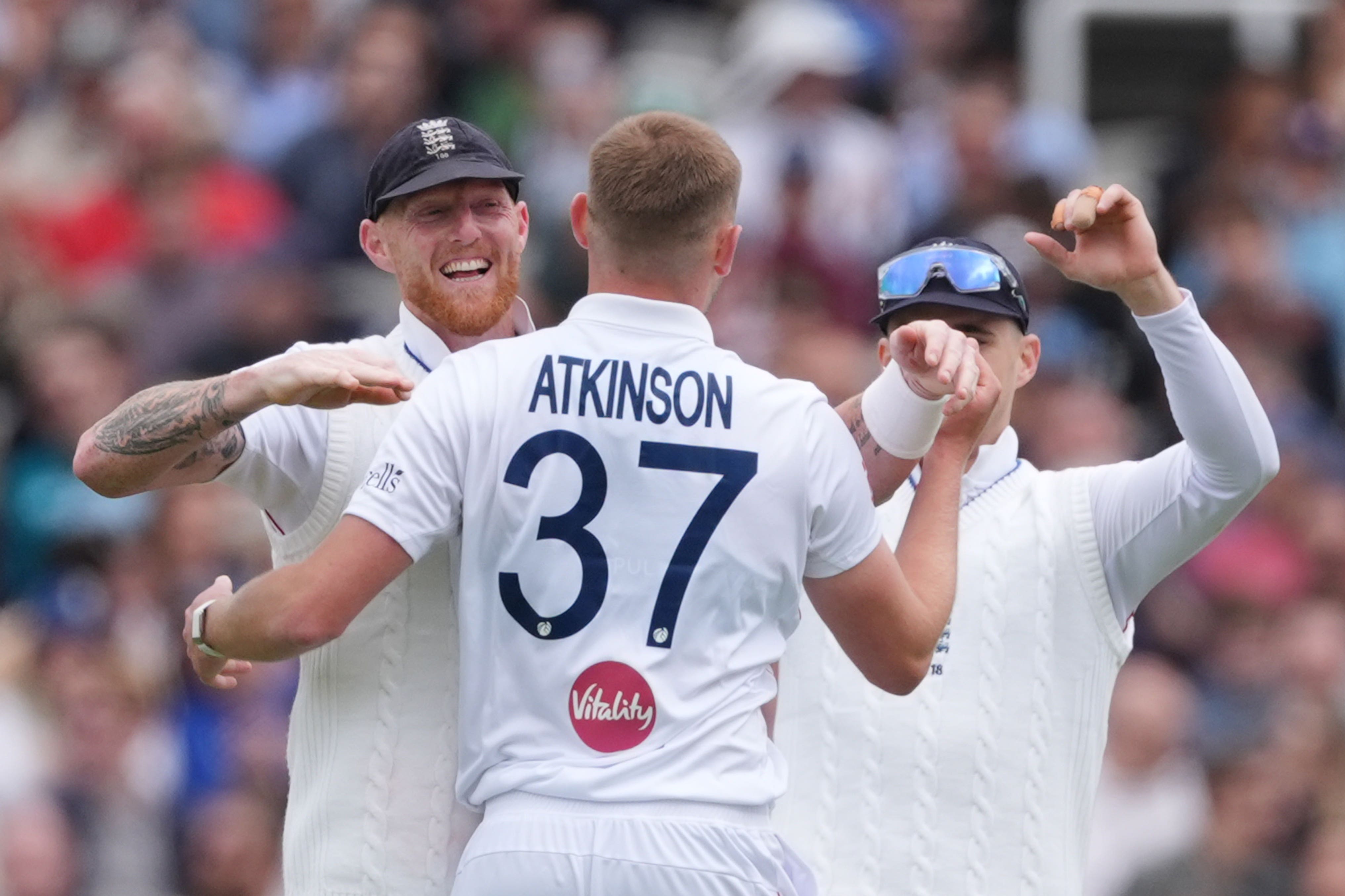 England’s Gus Atkinson and Ben Stokes celebrate the wicket of New Zealand’s Kyle Jamieson (Ben Whitley/PA) (PA Wire)