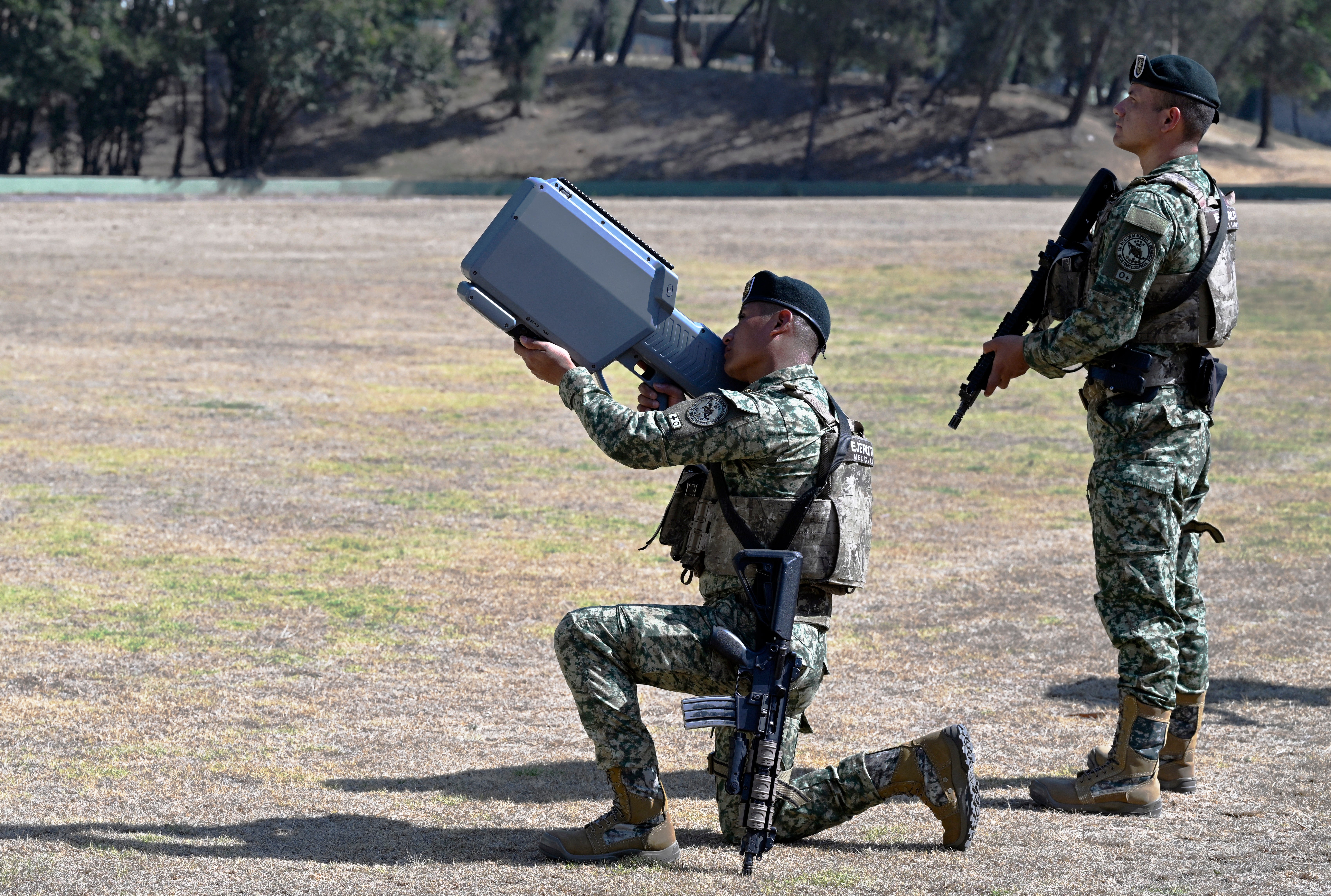 Popular counter-drone measures including radars, jamming technology and anti-drone guns, such as the one being demonstrated here by a member of the Mexican Army's special anti-drone battalion in February