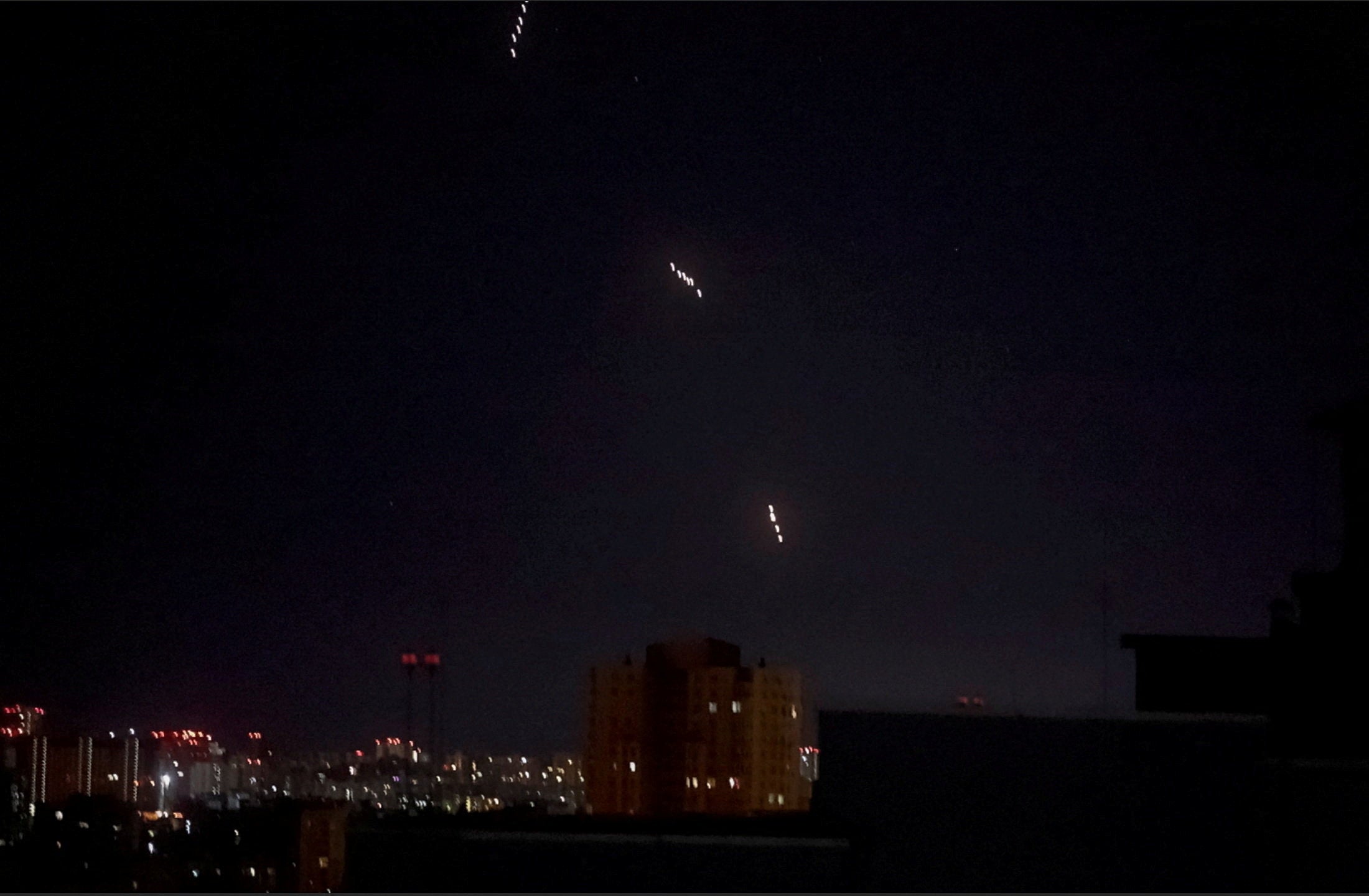 Russian missiles, which appear to be the Oreshnik hypersonic ballistic missile, according to the Ukrainian Air Force, fly during a Russian missile and drone strike, amid Russia's attack on Kyiv on May 24, 2026.