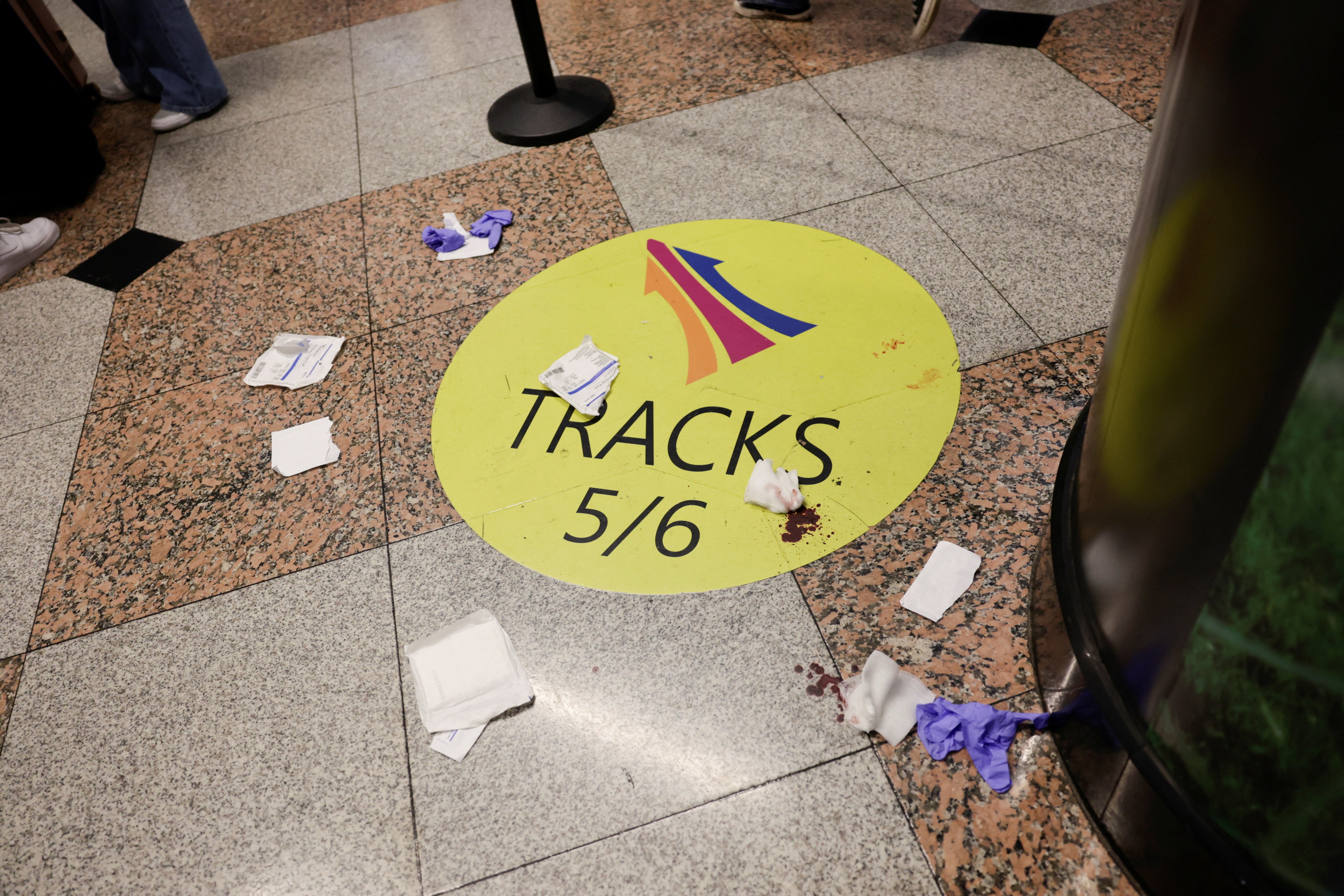 Traces of blood can be seen on the floor at Penn Station after the alleged stabbing incident (Reuters)