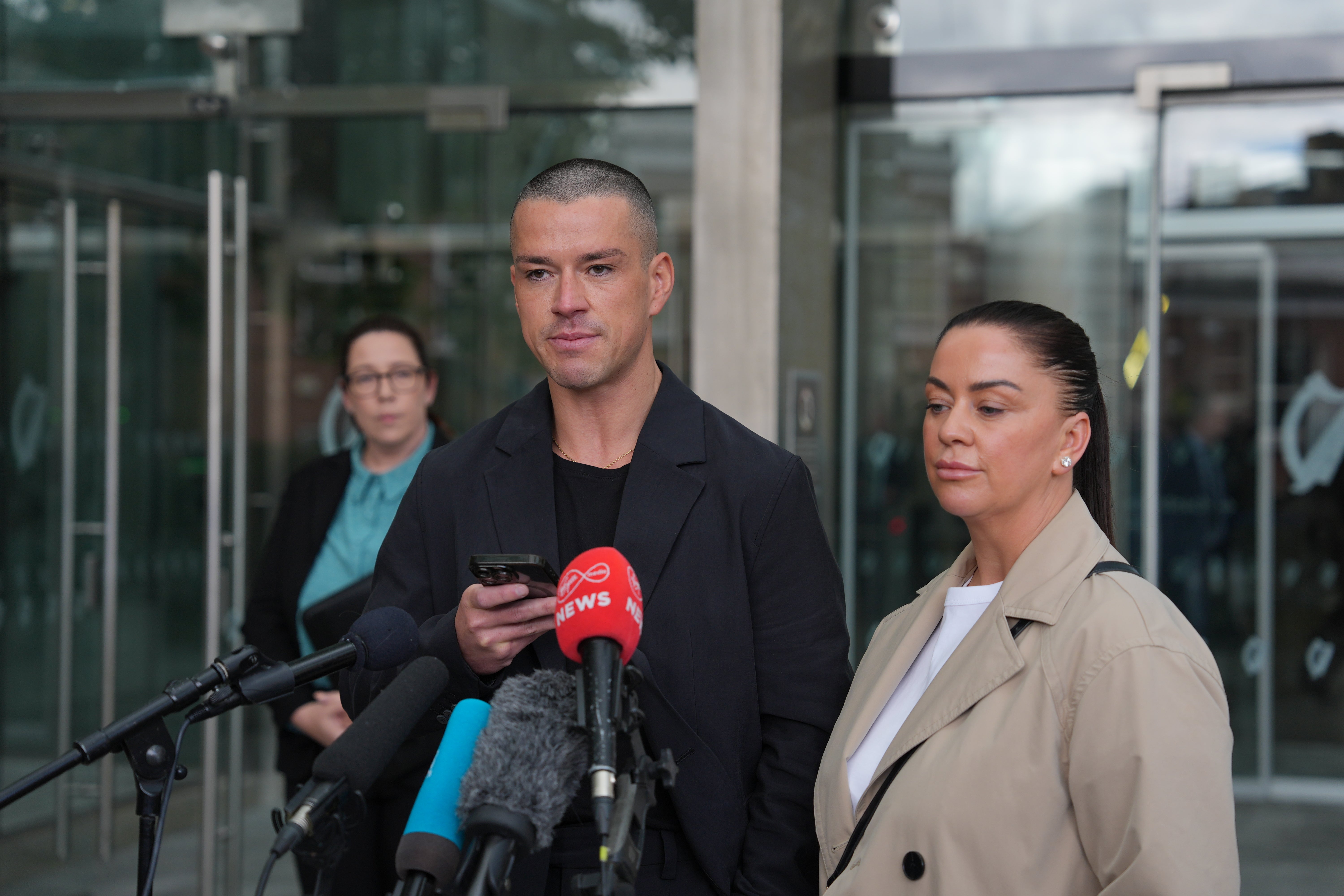 Noel Kirwan's children Kristopher and Donna Kirwan speak outside the Special Criminal Court in Dublin following the sentencing (PA)